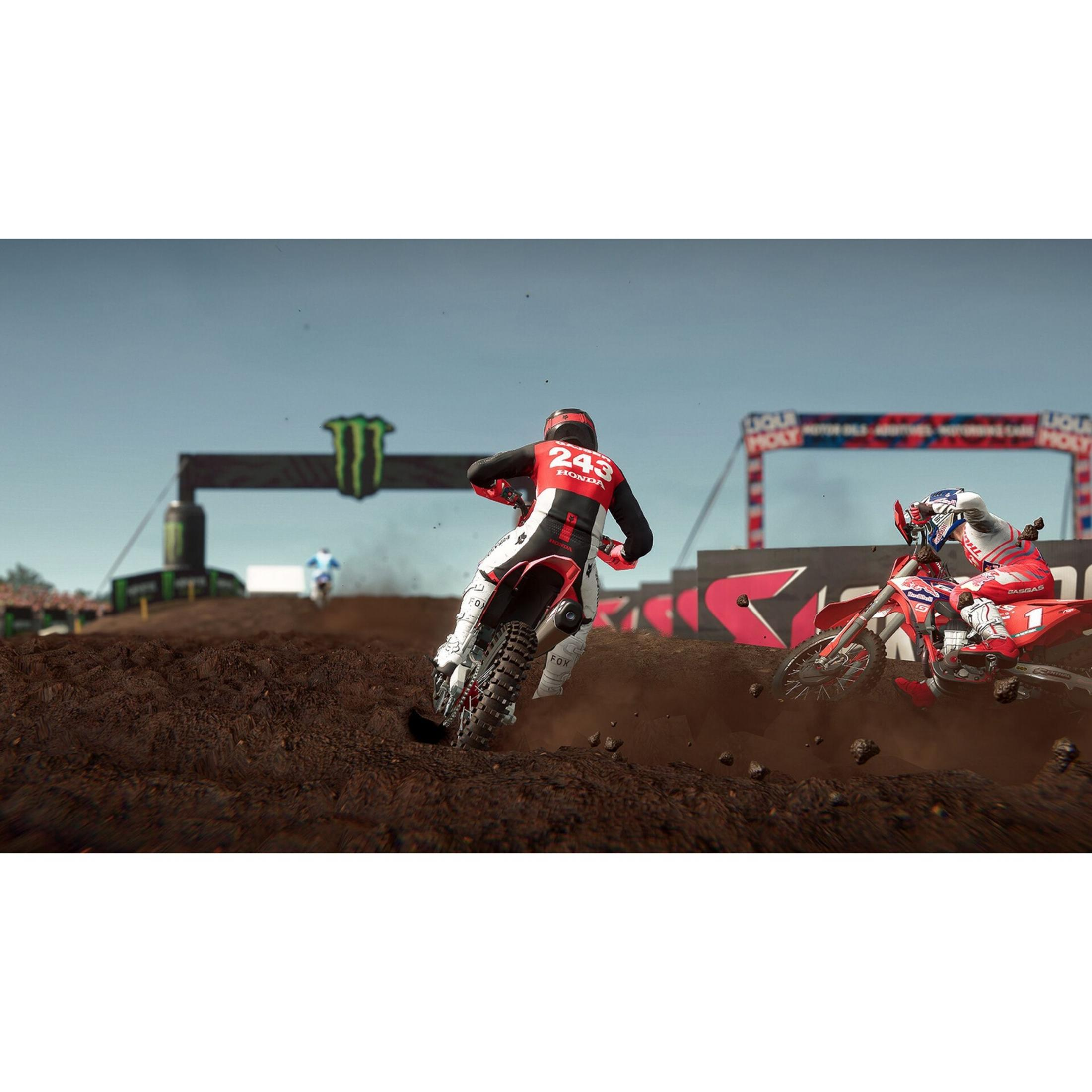 Due piloti di motocross gareggiano su una pista di fango, un pilota in rosso e bianco, l'altro in nero e rosso.