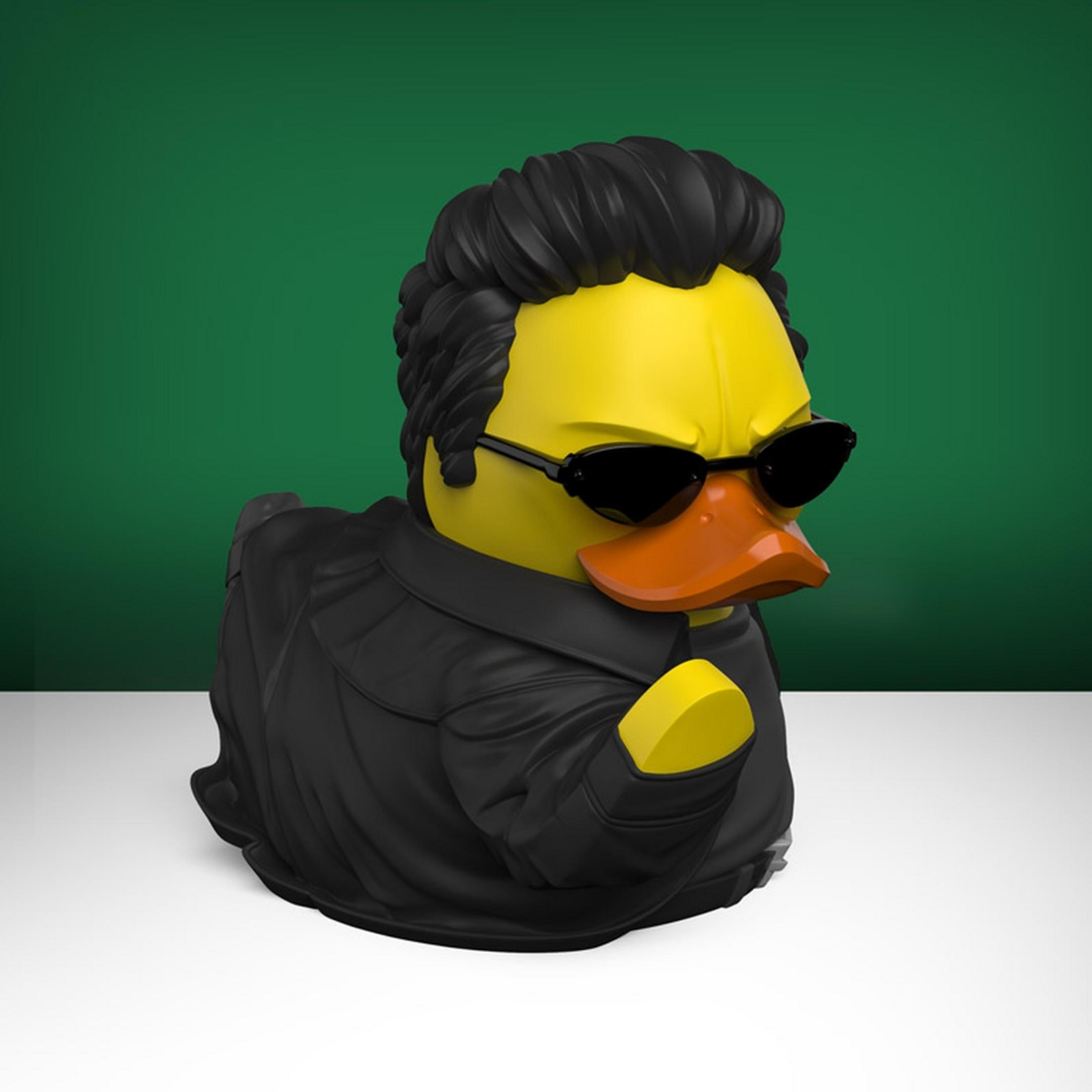 Gelbe Gummiente mit schwarzer Lederjacke, Sonnenbrille und Frisur.