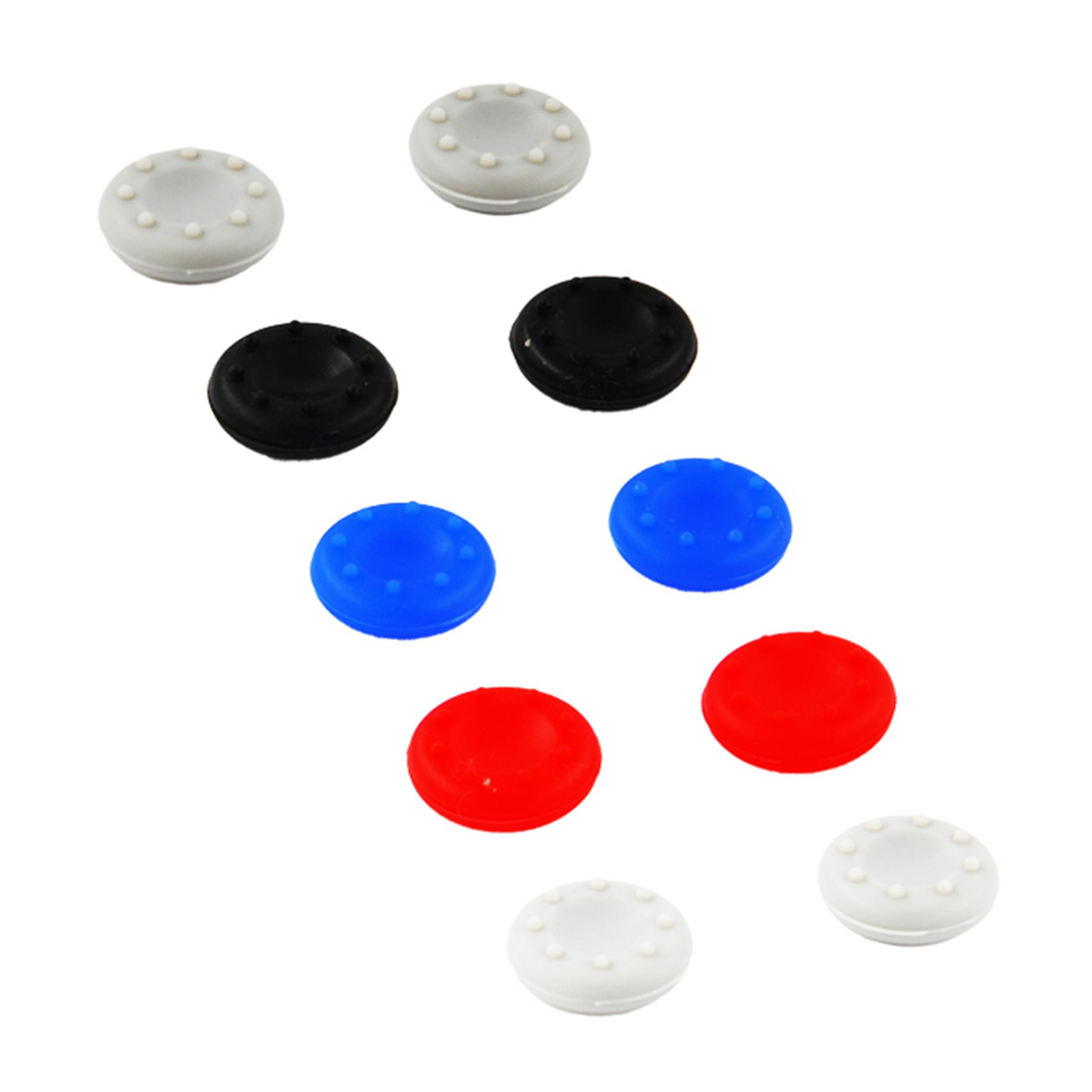Un gruppo di otto cappucci per joystick grigi, neri, blu e rossi, con texture a punti.