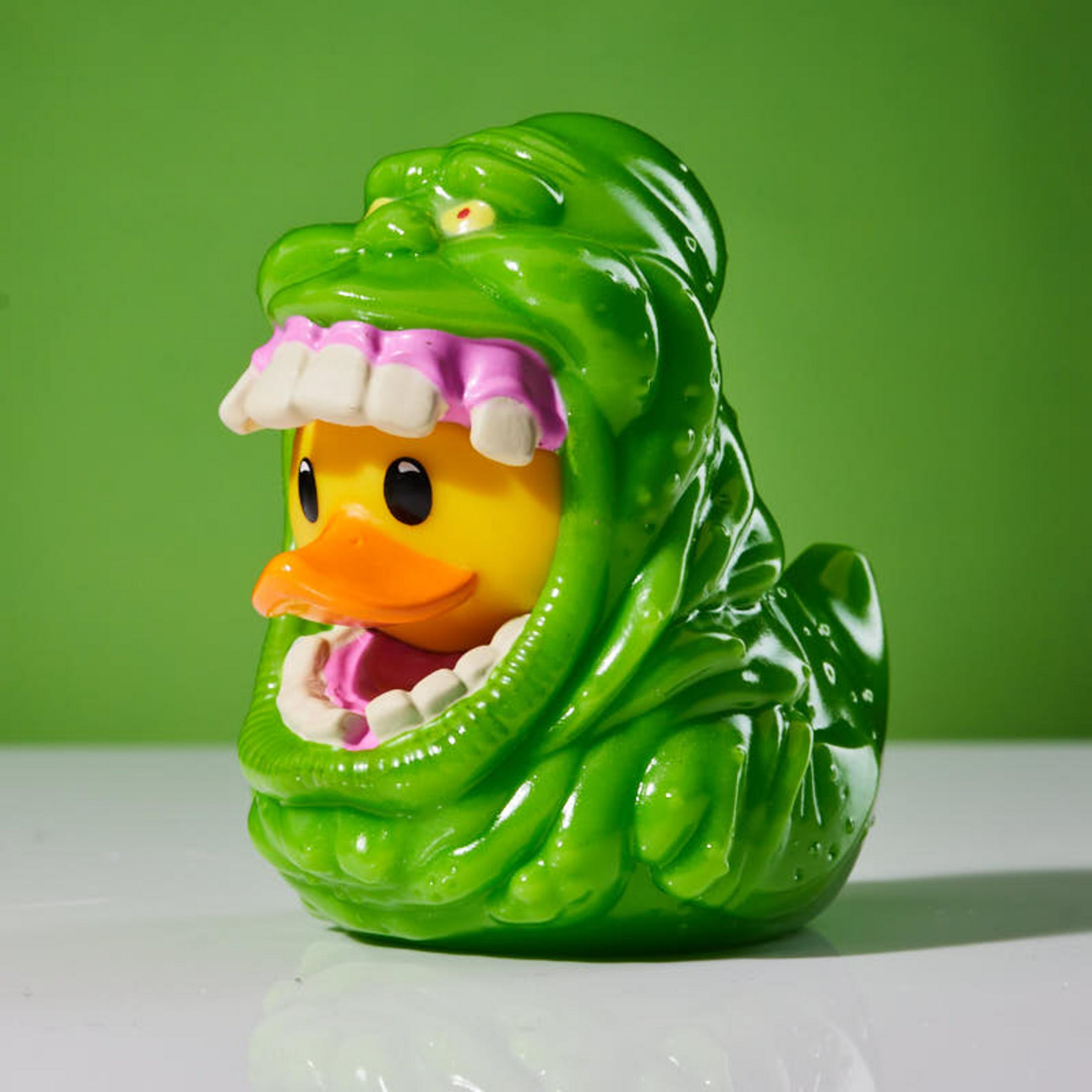 Gelbe Ente mit grüner Geister-Verkleidung und weißen Zähnen.