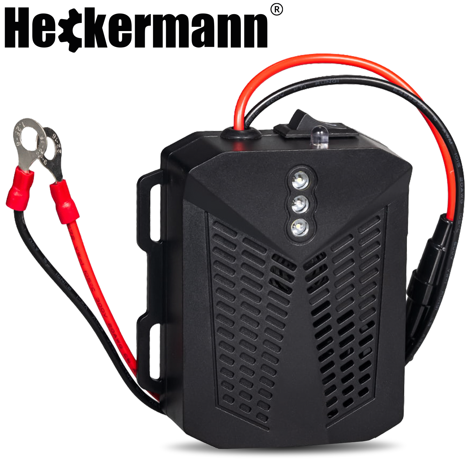 Czarny sprzęt elektroniczny z czerwonymi i czarnymi przewodami, przełącznikiem i diodami.