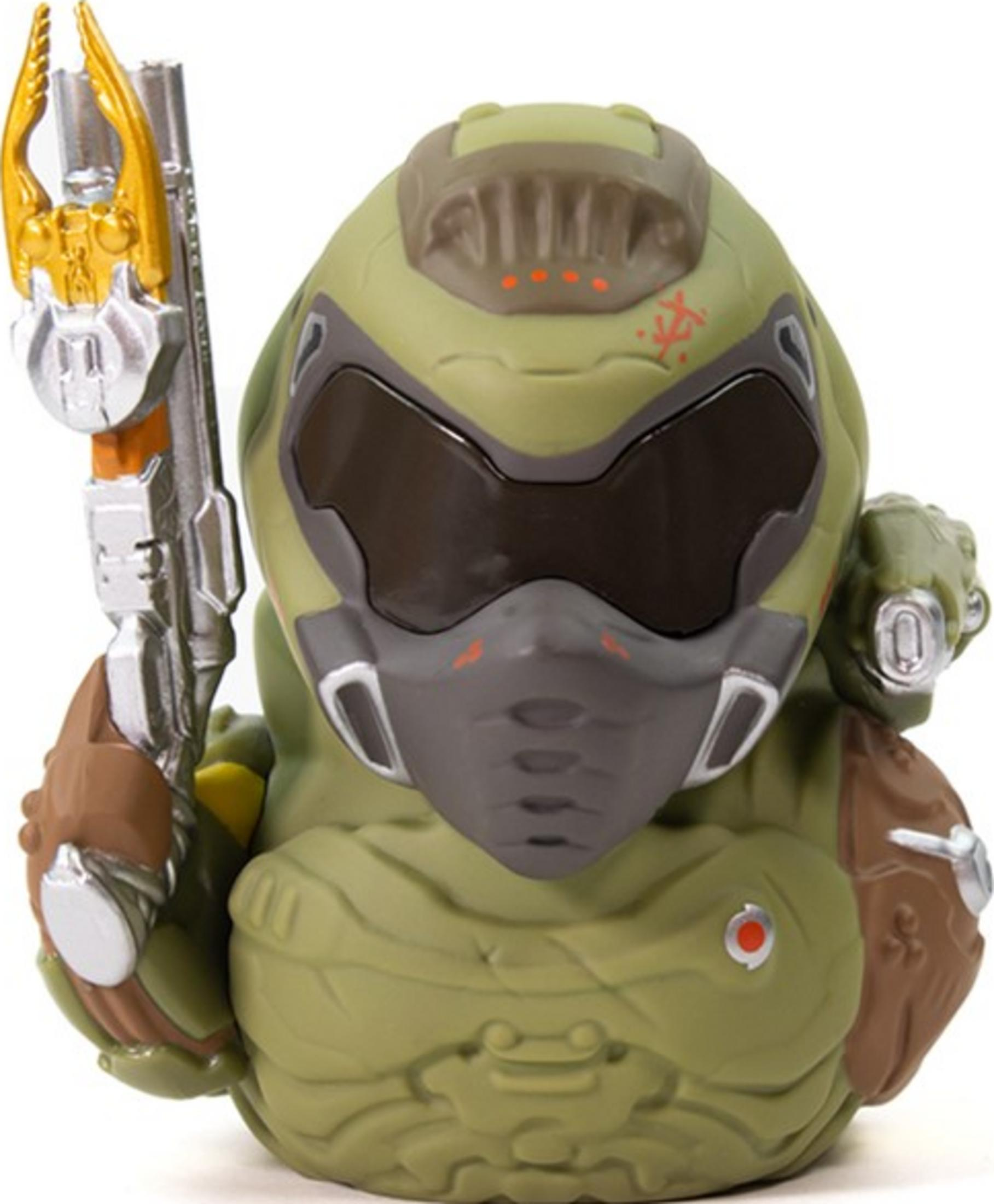 Grüne Gummi-Figur im Stil des Doom Slayer mit silberner Waffe.