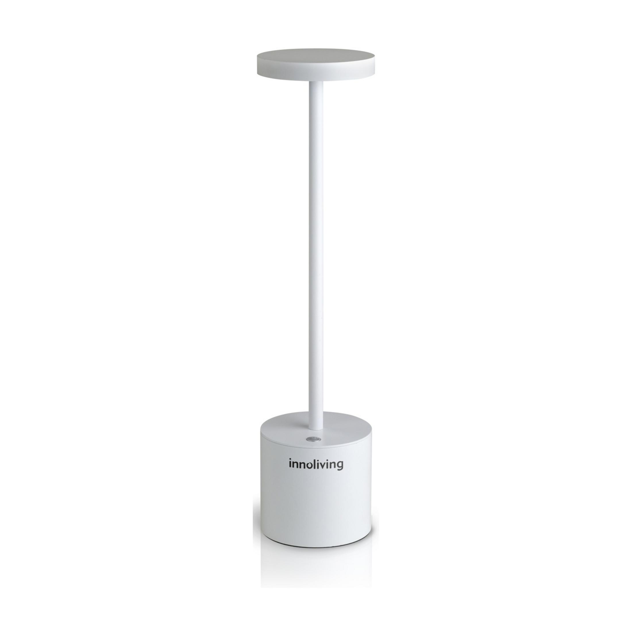 Una lampada da scrivania bianca con base cilindrica e stelo lungo.