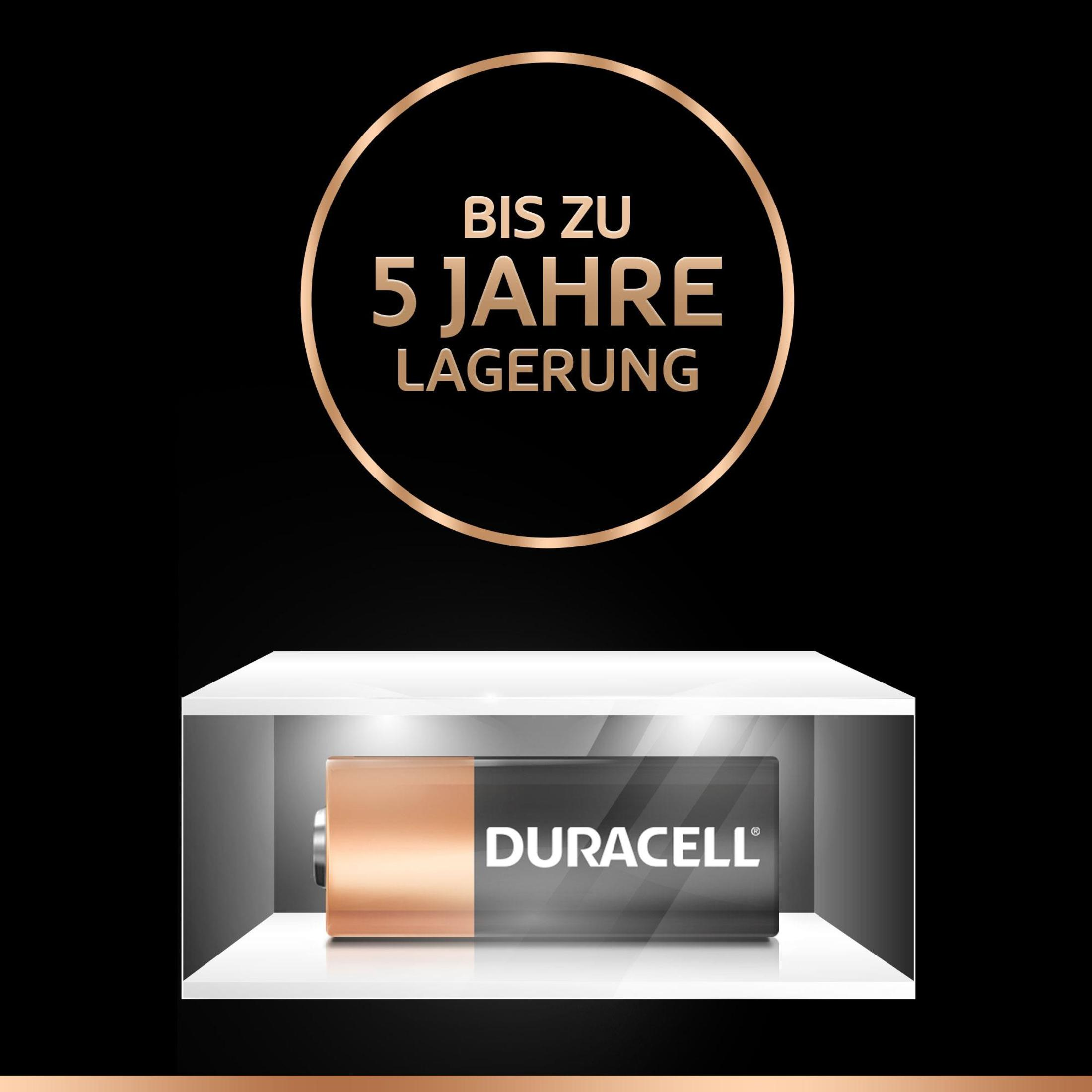 Duracell battery on a white pedestal with text 'Up to 5 years storage'.