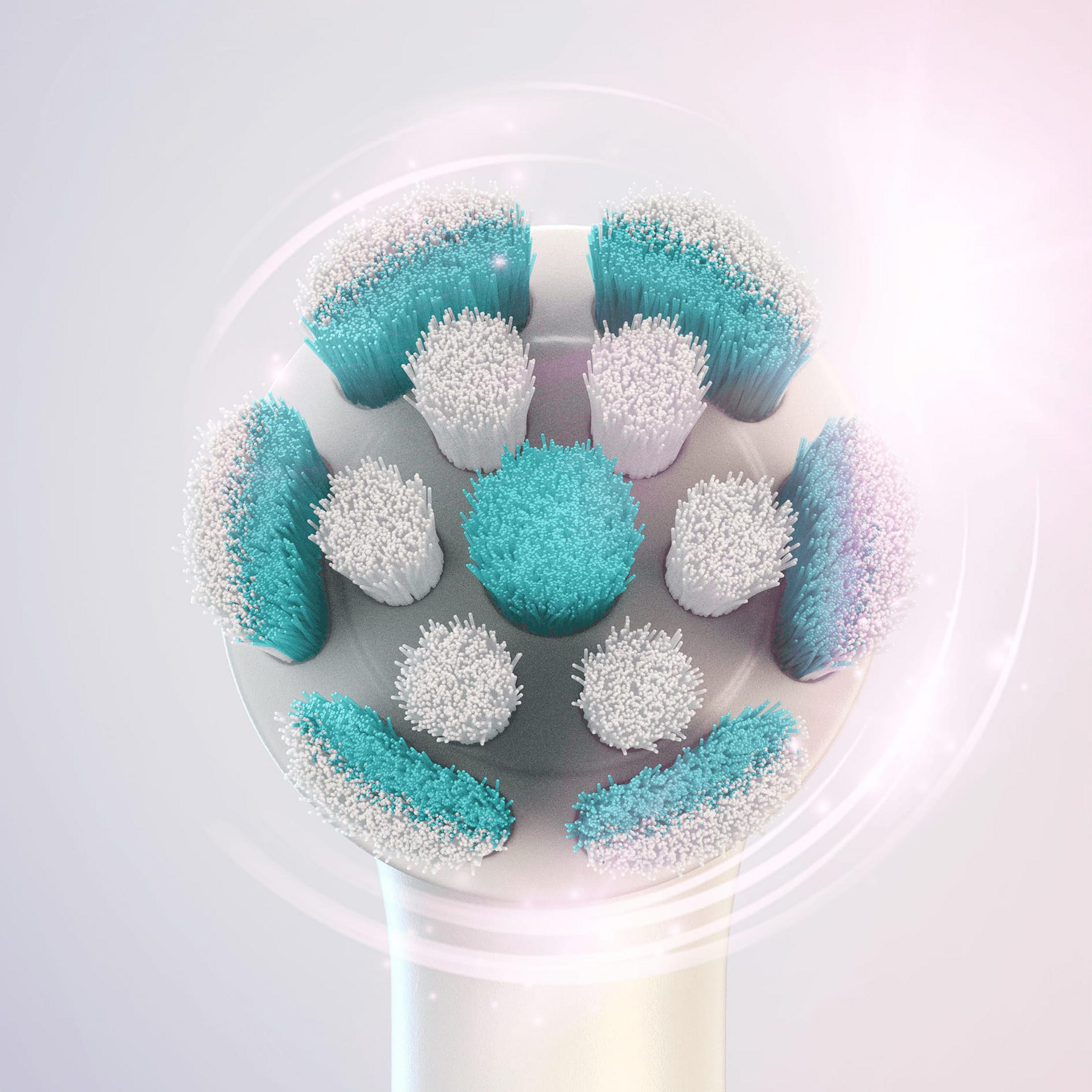 Primer plano de un cabezal de cepillo de dientes eléctrico con cerdas azules y blancas.