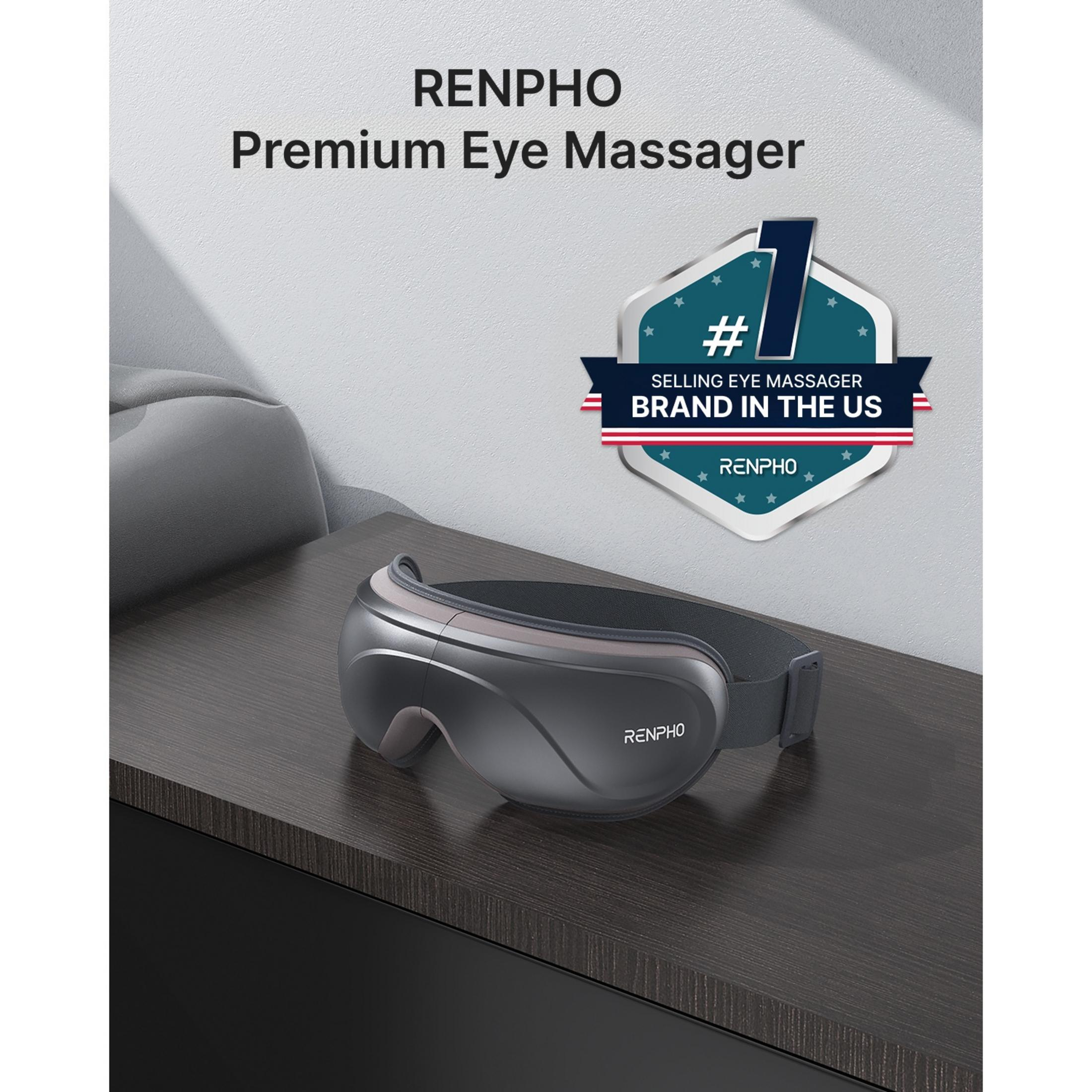 Ein dunkler Augenmassager von Renpho liegt auf einem Holztisch.
