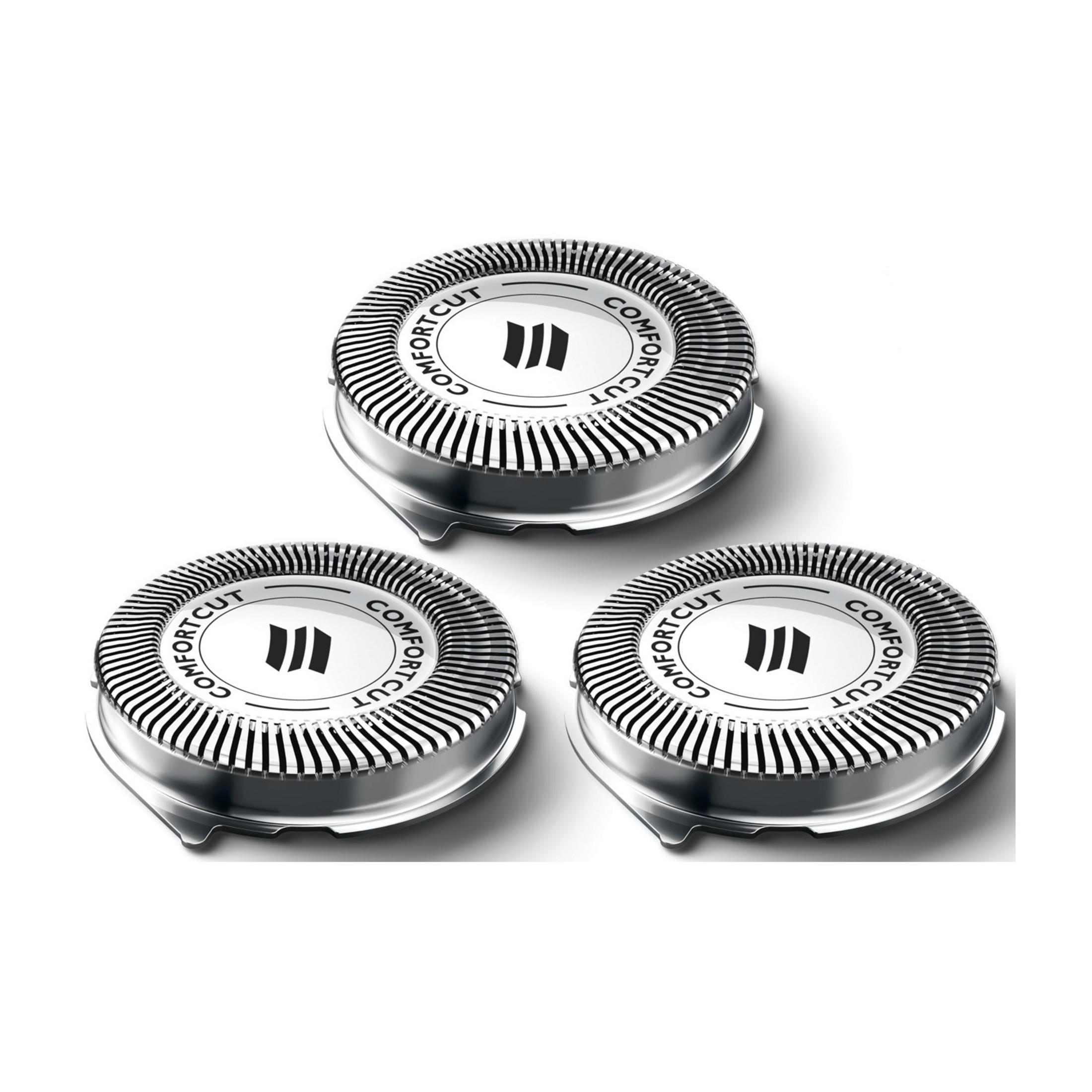 Trzy srebrne głowice golące z czarnymi paskami i napisem "COMFORTCUT".