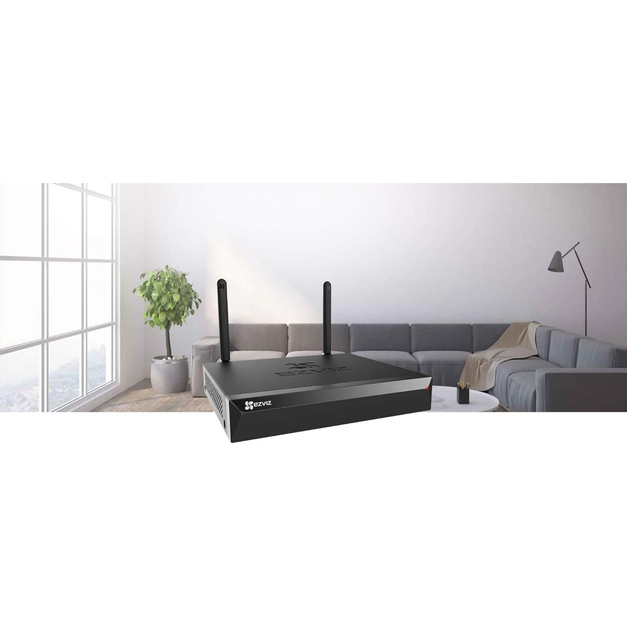 Schwarzer EZVIZ-Recorder mit Antennen in einem modernen Wohnzimmer.