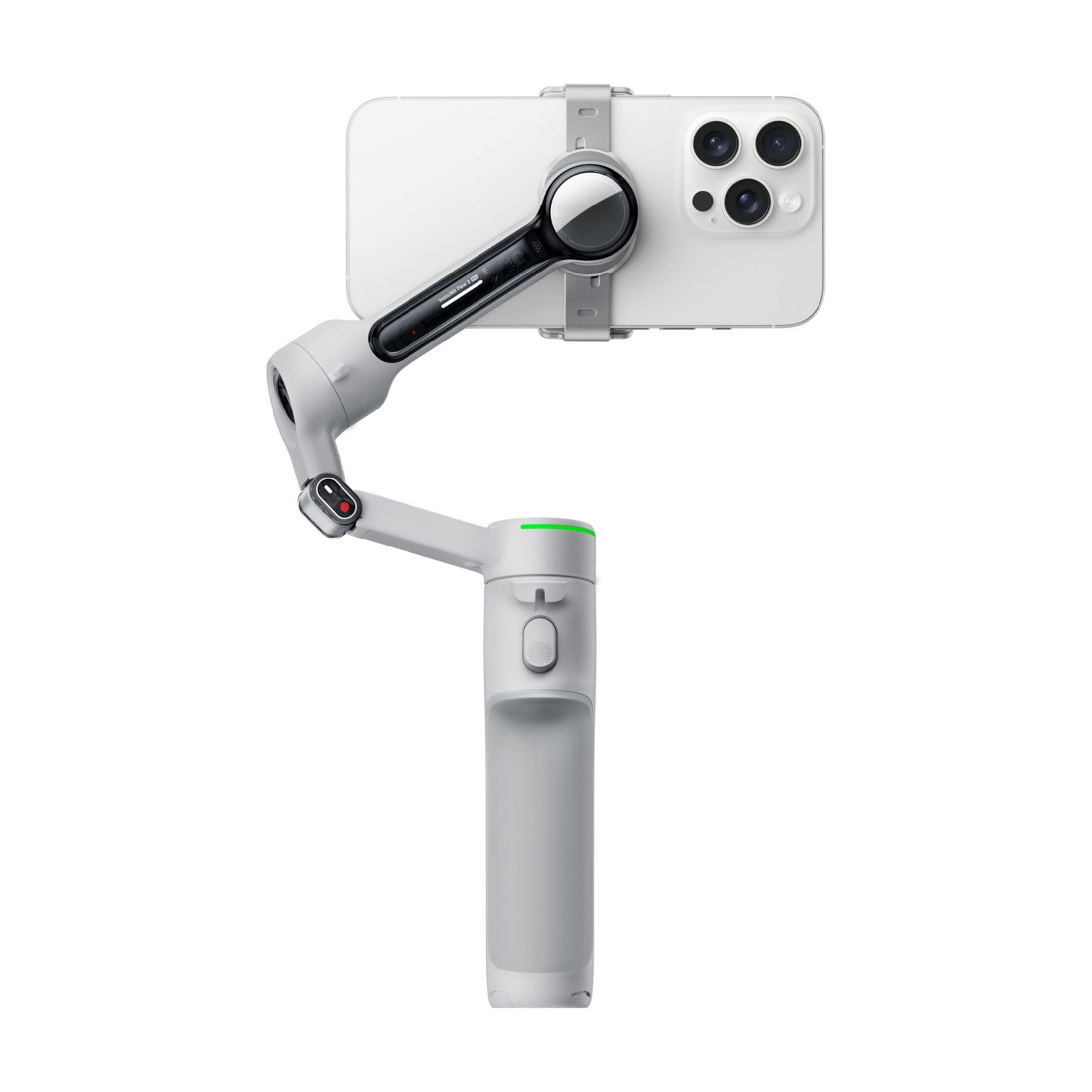 Ein wei'er Smartphone-Gimbal mit einem silbernen iPhone und grüner Ladeanzeige.