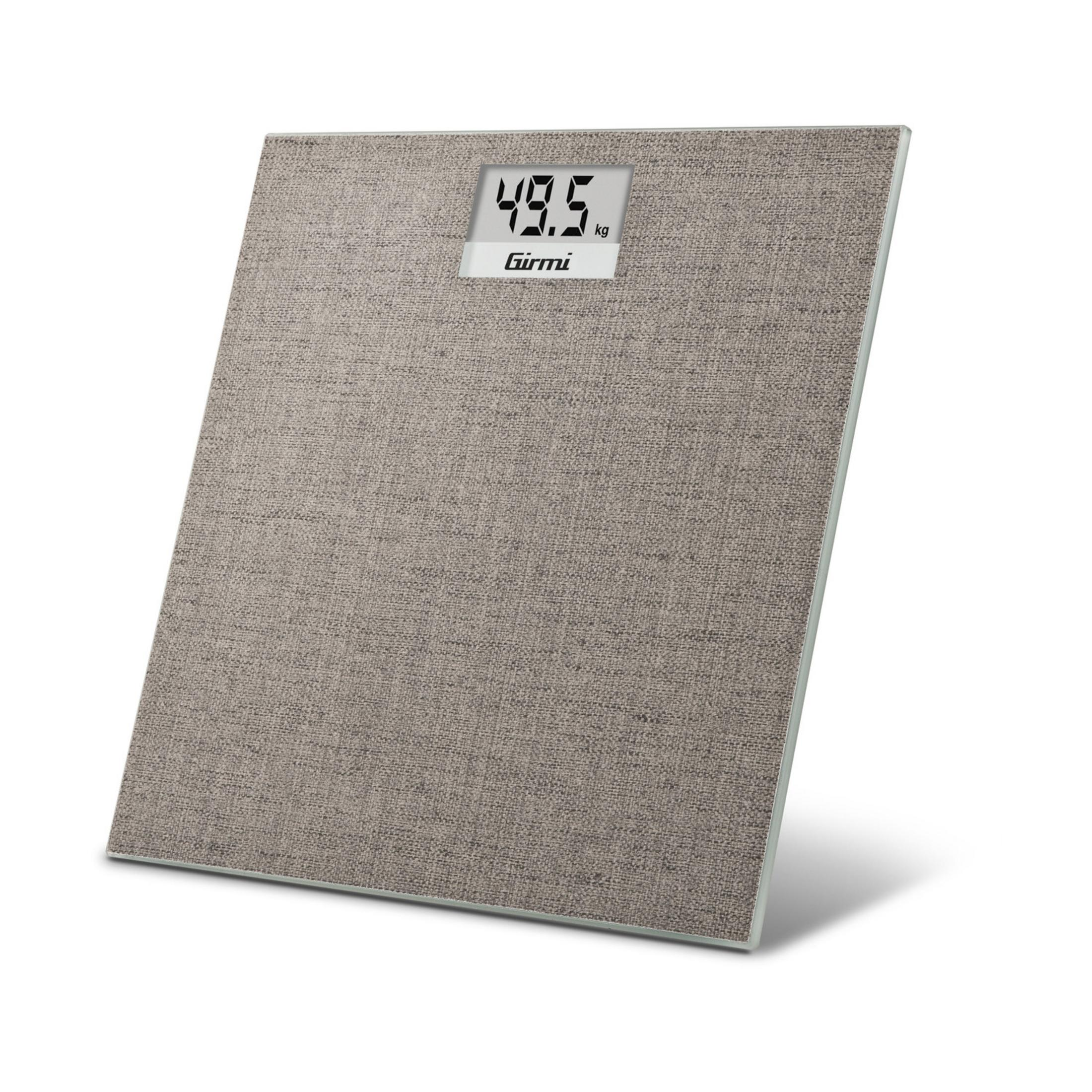 Bilancia digitale con superficie in tessuto grigio e display illuminato.