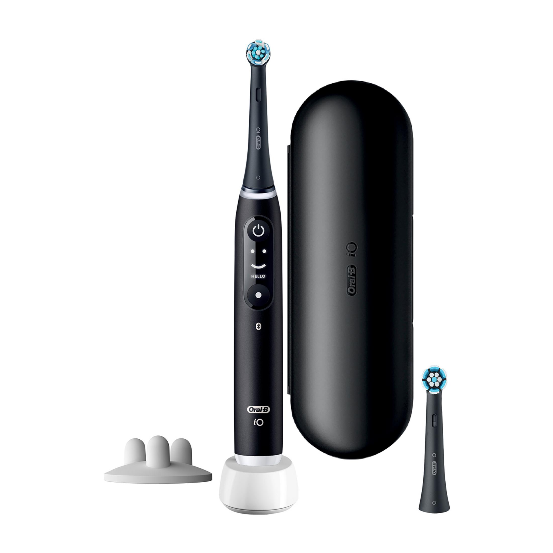 Czarna szczoteczka elektryczna z ładowarką, etui podróżnym i zapasową końcówką.