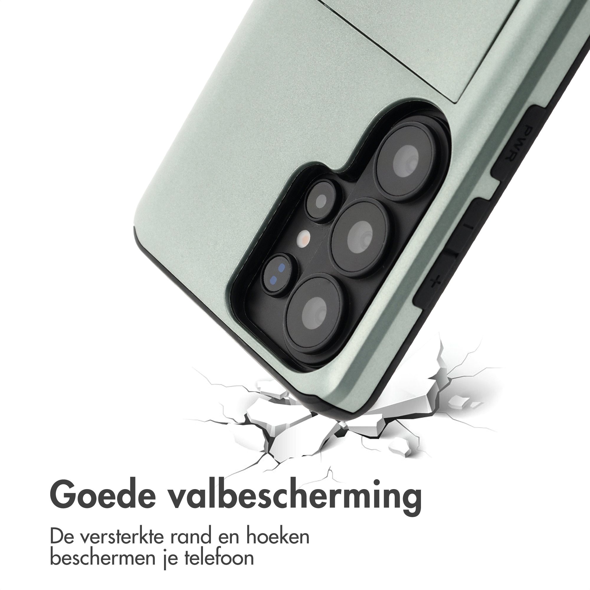 Een lichtgroene telefoonhoes met camera en knoppen die op een gebarsten oppervlak valt.