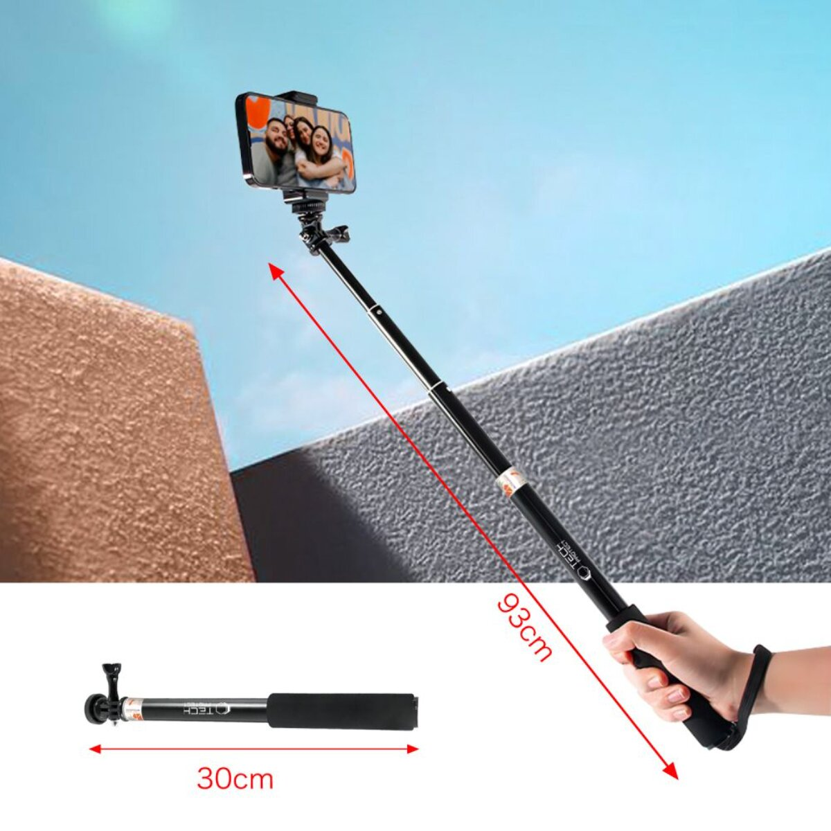 Un selfie stick nero che tiene uno smartphone. Lunghezze mostrate 30cm e 93cm.