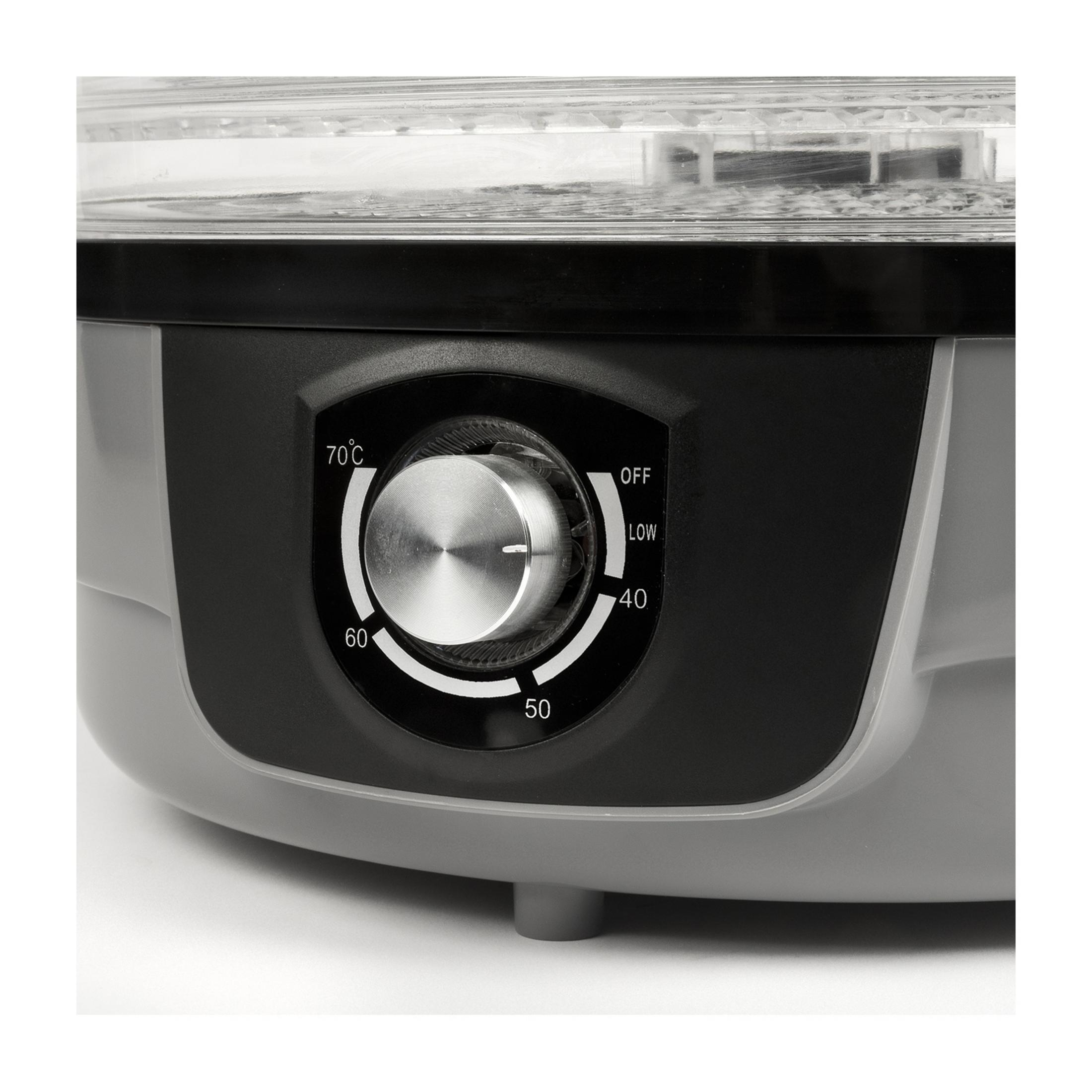 Nahaufnahme eines Temperaturreglers mit Skala von 40-70°C, 'LOW' und 'OFF'.