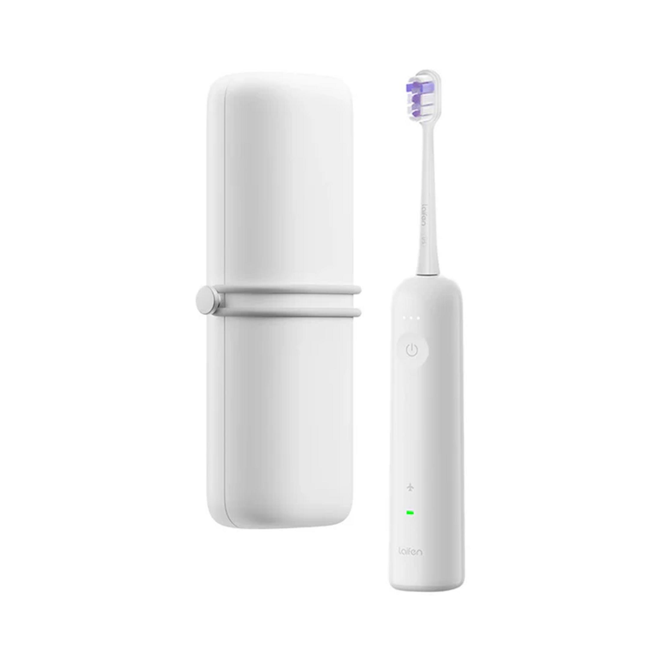 Biała szczoteczka elektryczna z etui ładującym. Fioletowe włosie.