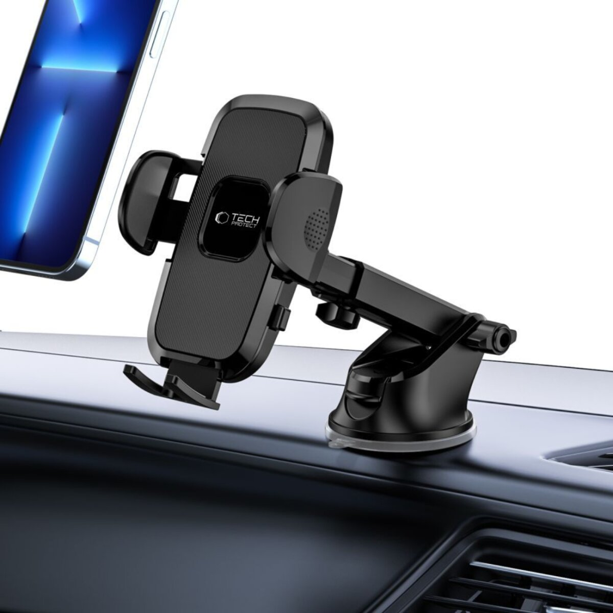 Ein schwarzer Autohalter mit einem Smartphone, auf einem Armaturenbrett montiert.
