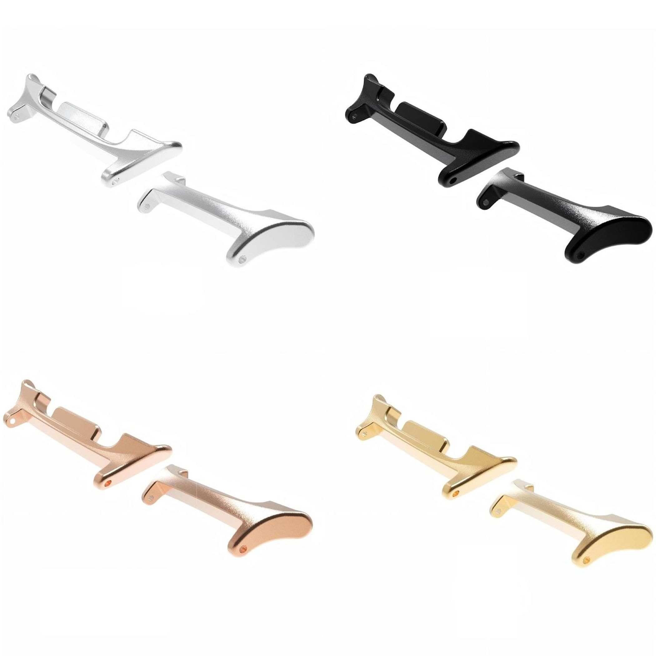 Vier Paar Armbandglieder in Silber, Schwarz, Roségold und Gold.