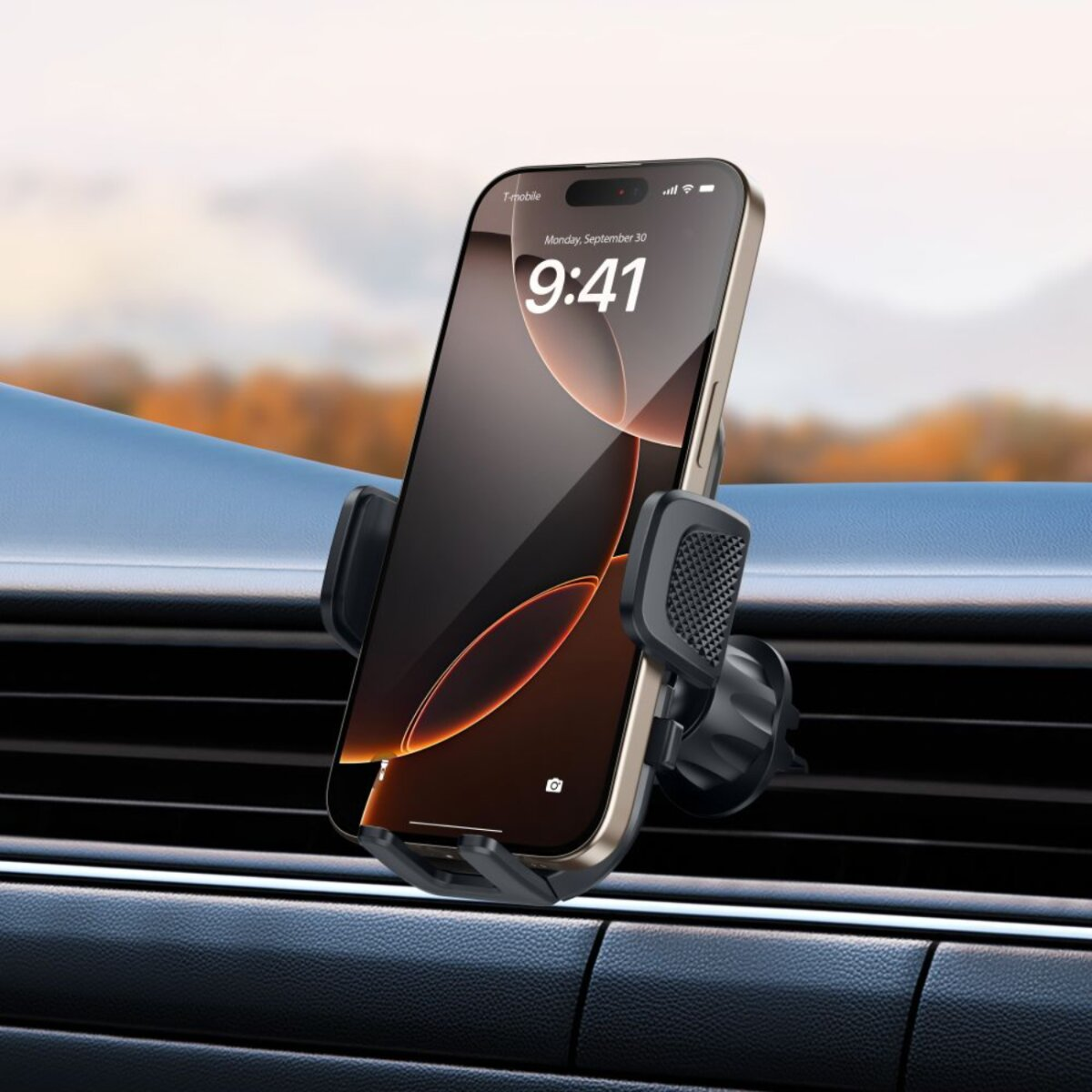 Ein Smartphone in einem schwarzen Autohalter, montiert an einem Lüftungsschlitz.