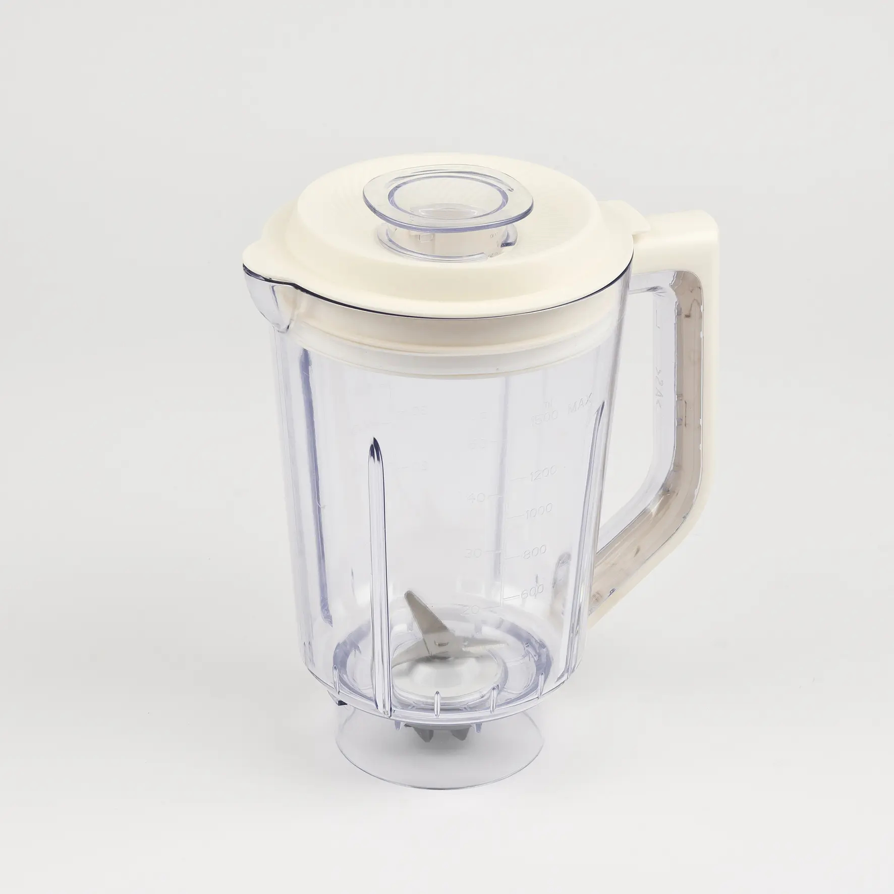 Caraffa trasparente per frullatore con coperchio e manico color crema.