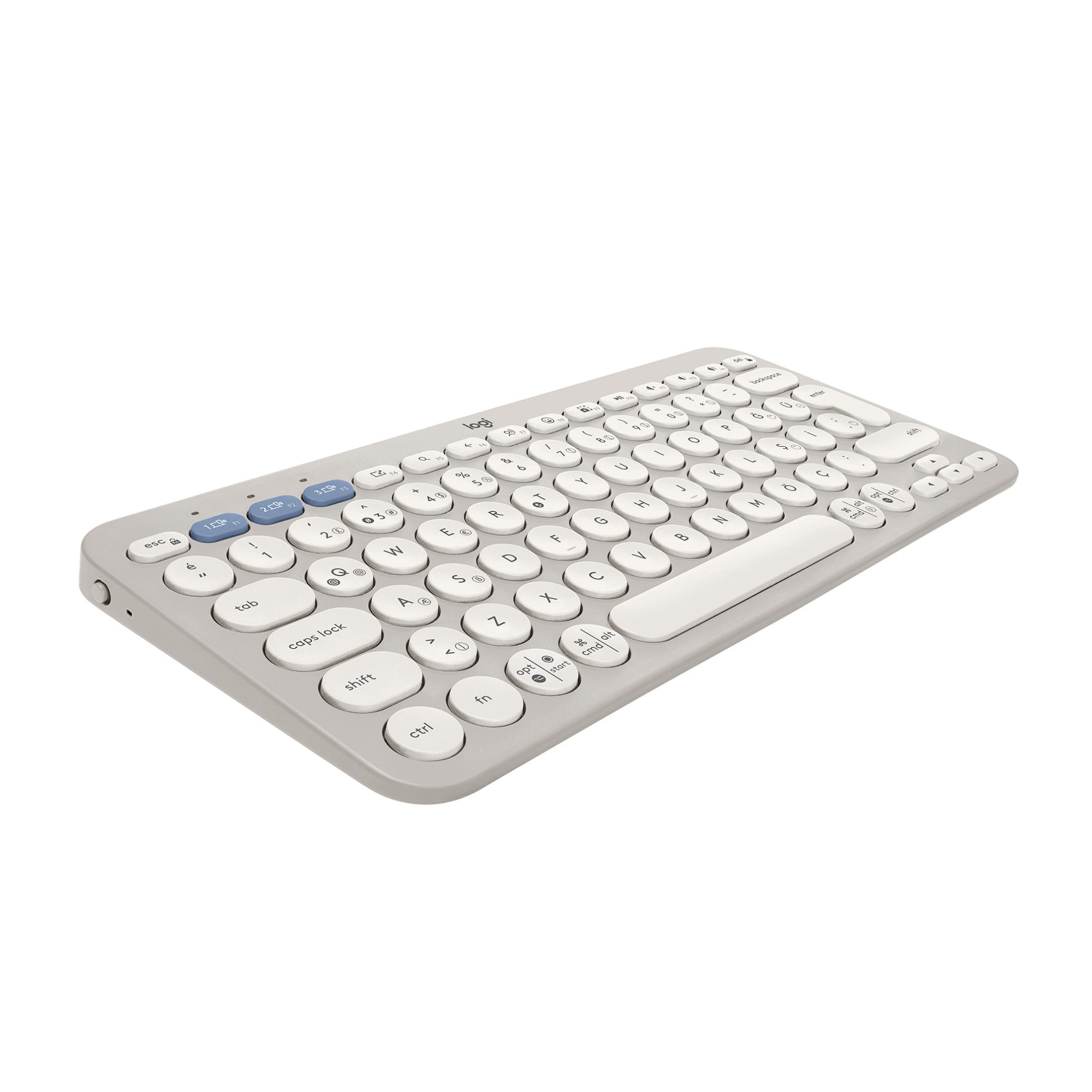 Szara bezprzewodowa klawiatura Logitech z okrągłymi klawiszami na białym tle.
