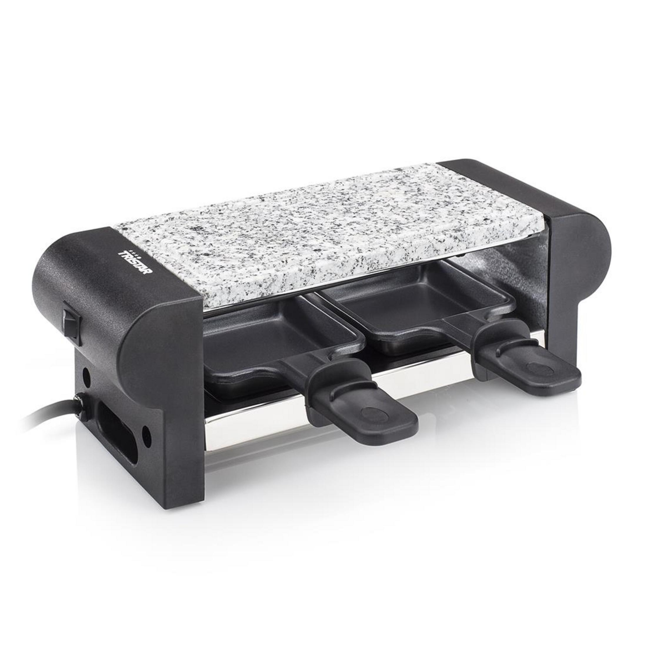 Grill raclette compatto con pietra ollare e due padelle.