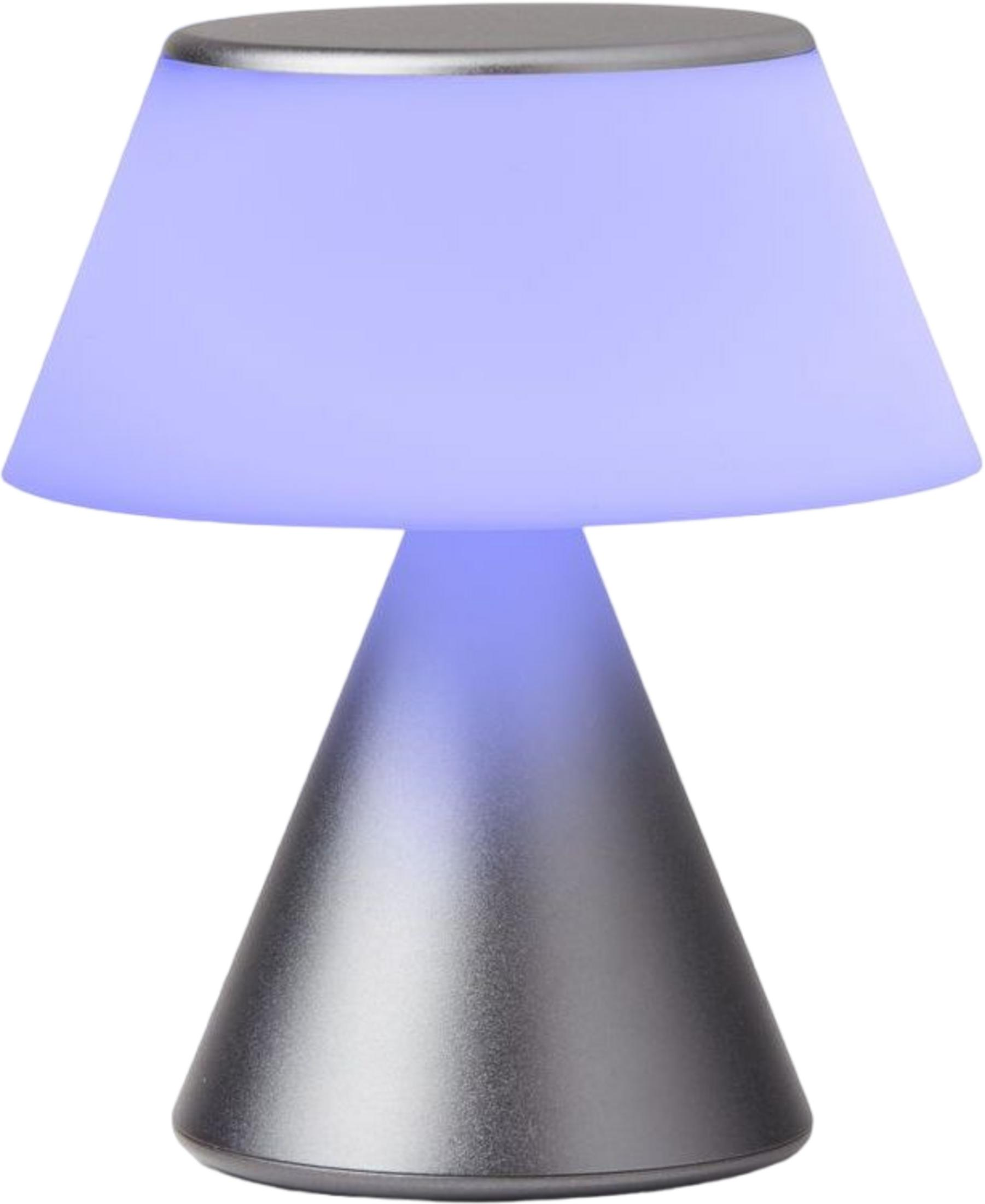 Una lampada argentata con bagliore blu.