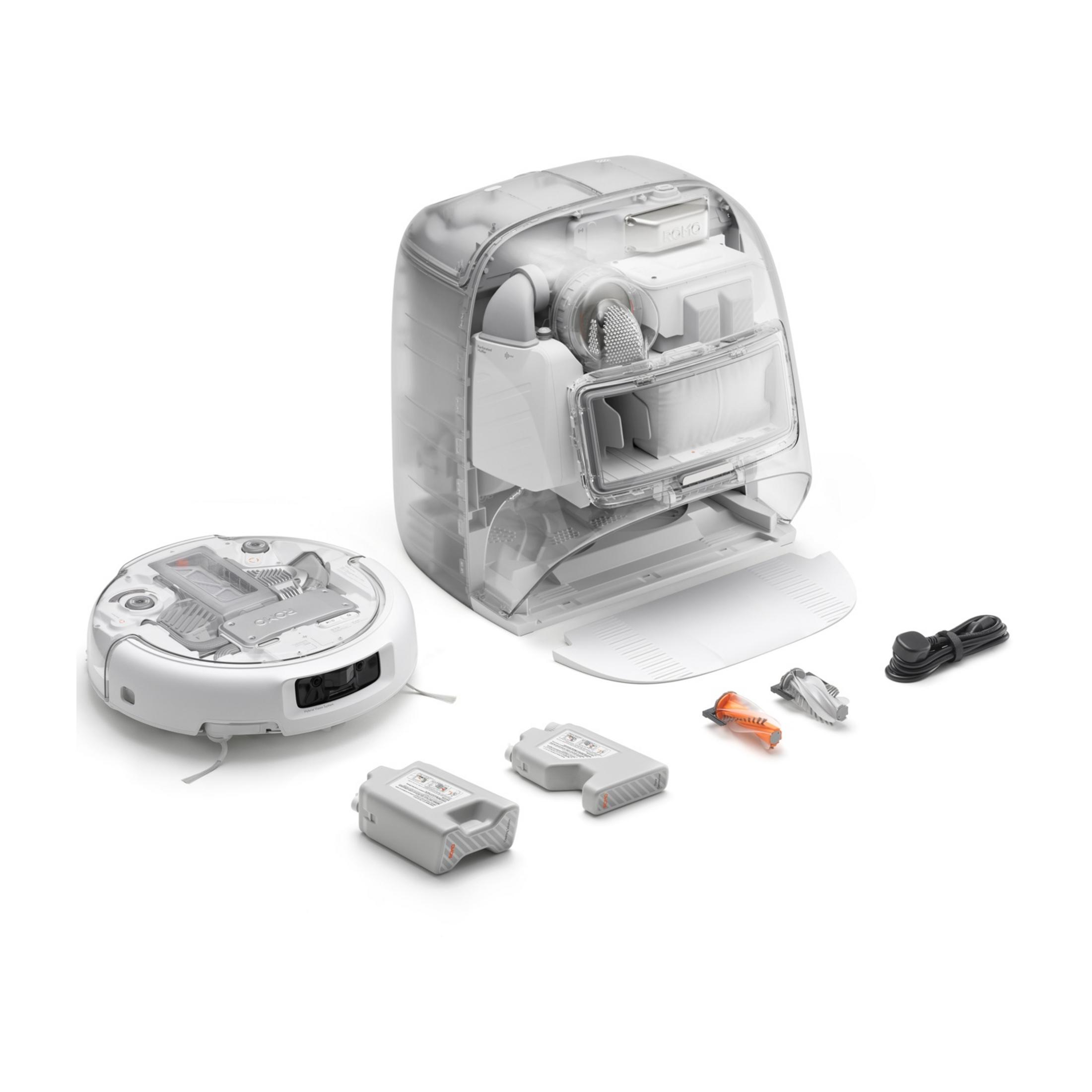 Odkurzacz automatyczny z akcesoriami, rozłożony na białym tle.