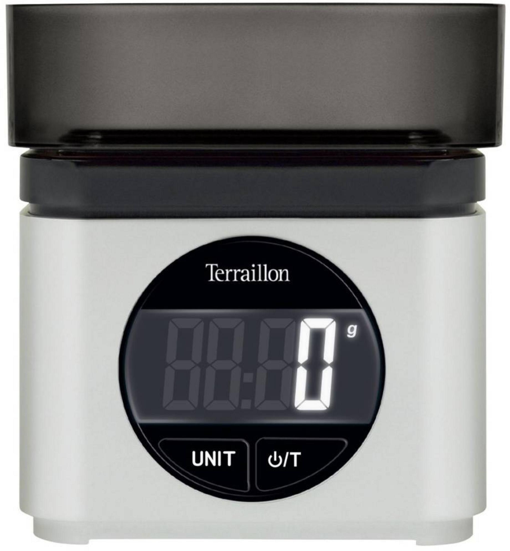 Una bilancia da cucina bianca con coperchio nero e display digitale mostra zero grammi.