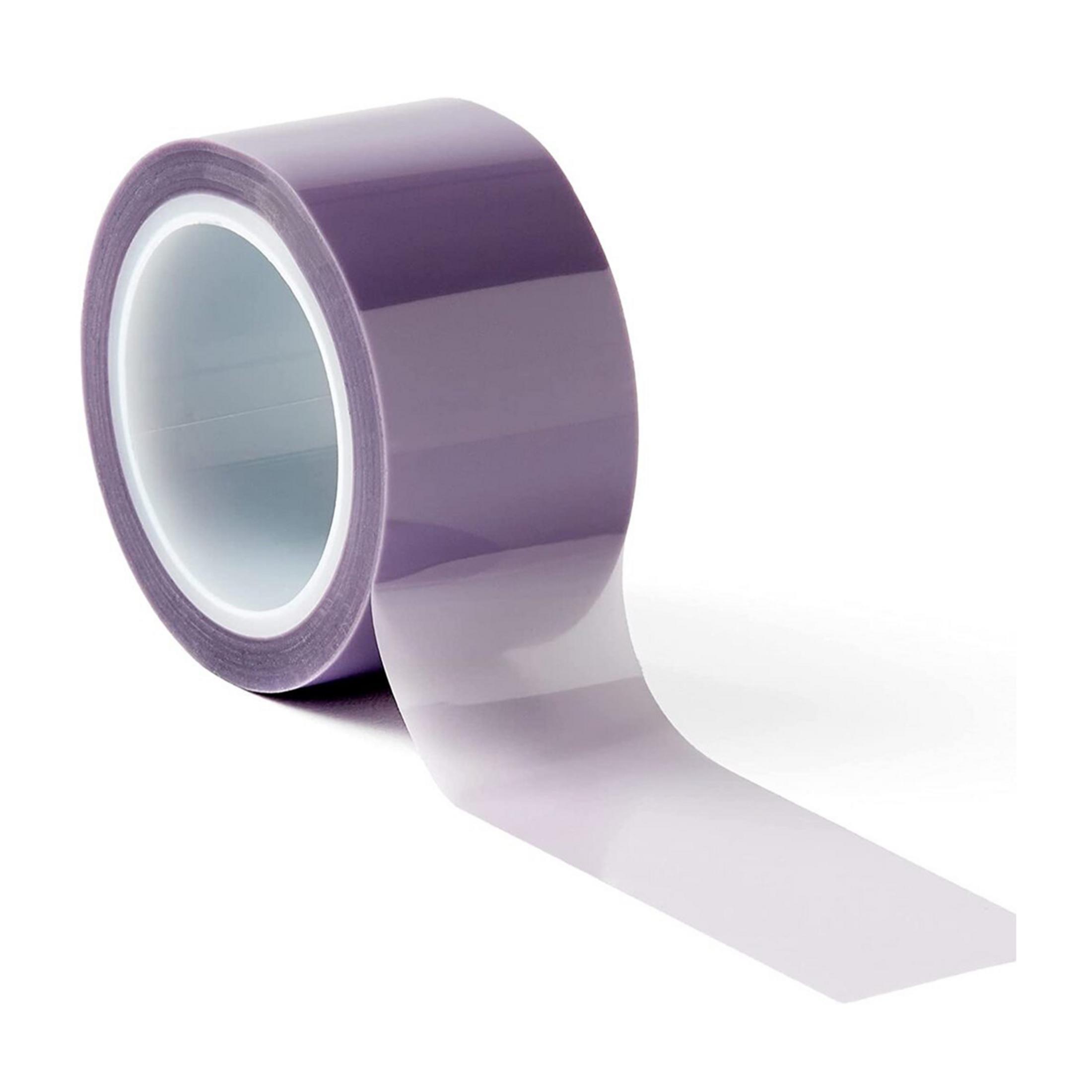 Un rotolo di nastro adesivo viola trasparente con nastro svolto.