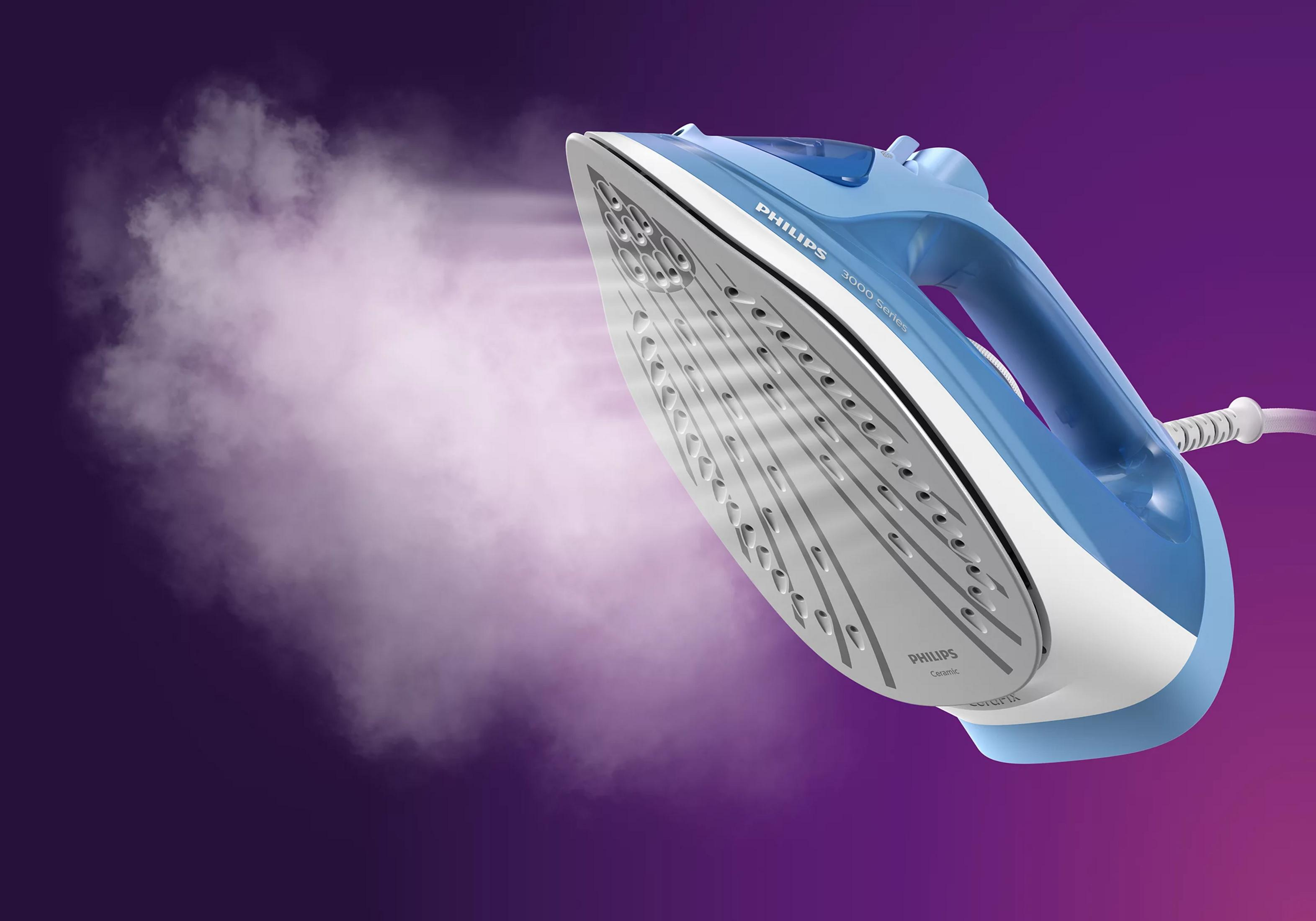 Ein blauer Philips Dampfbügeleisen gibt Dampf ab vor einem lila Hintergrund.