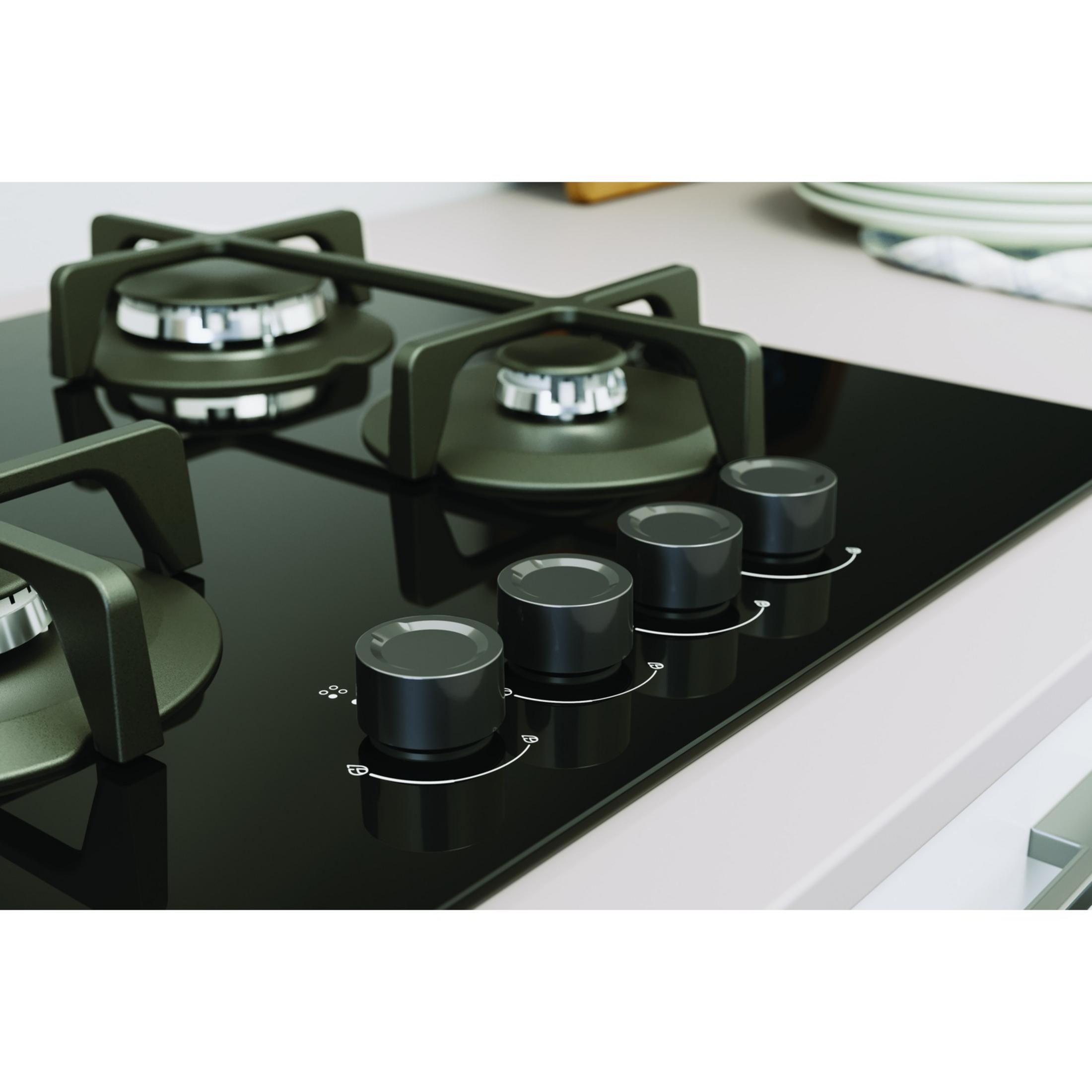 Czarna szklana płyta gazowa z czterema palnikami i metalowymi pokrętłami.