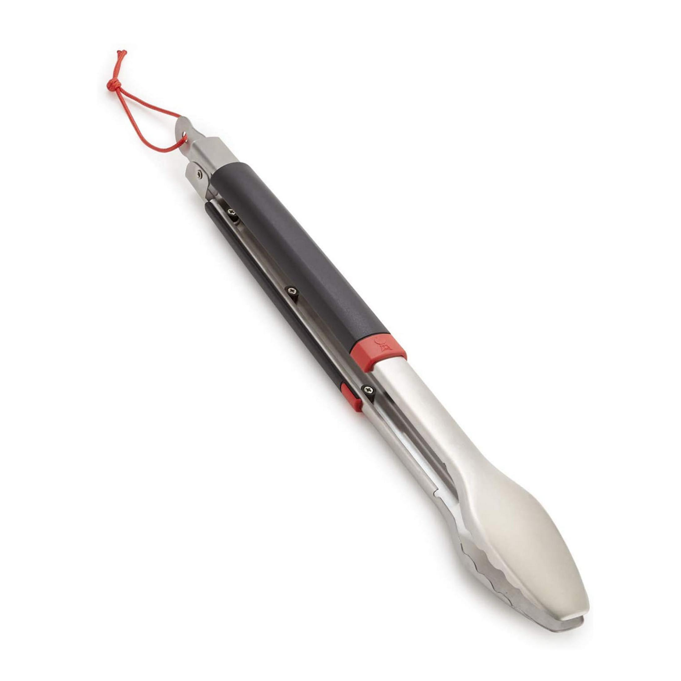 Metalowe szczypce do grilla z czarną rączką i czerwoną linką.