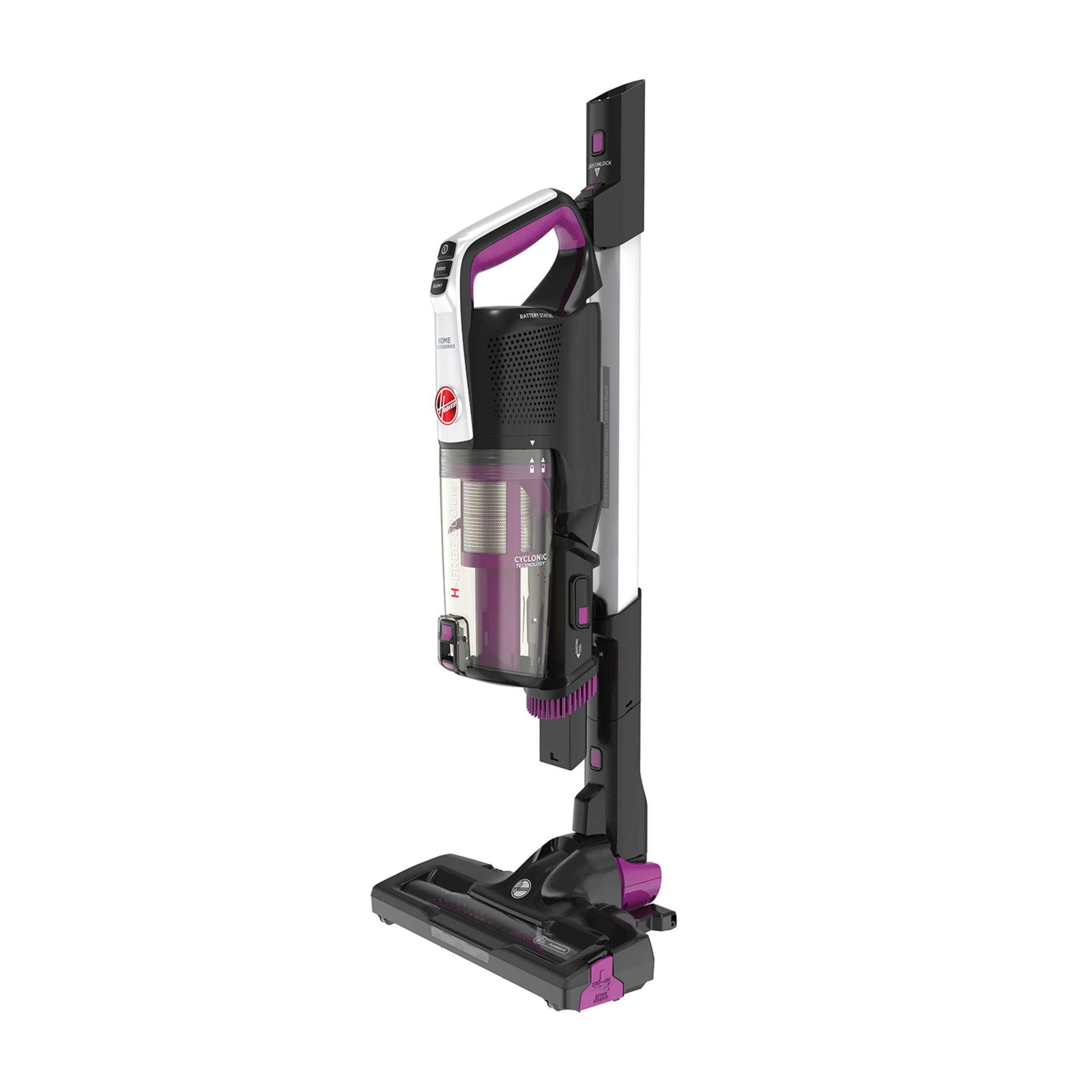 Un aspirapolvere senza fili con accenti viola sta sulla base di ricarica.