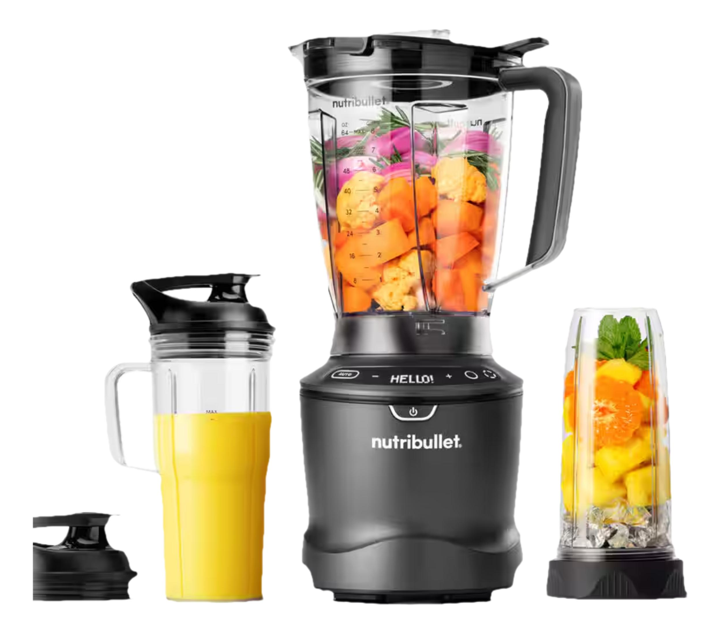 Ein grauer Nutribullet-Mixer mit Obst und Gemüse, ein gelber Becher und ein kleiner Behälter.