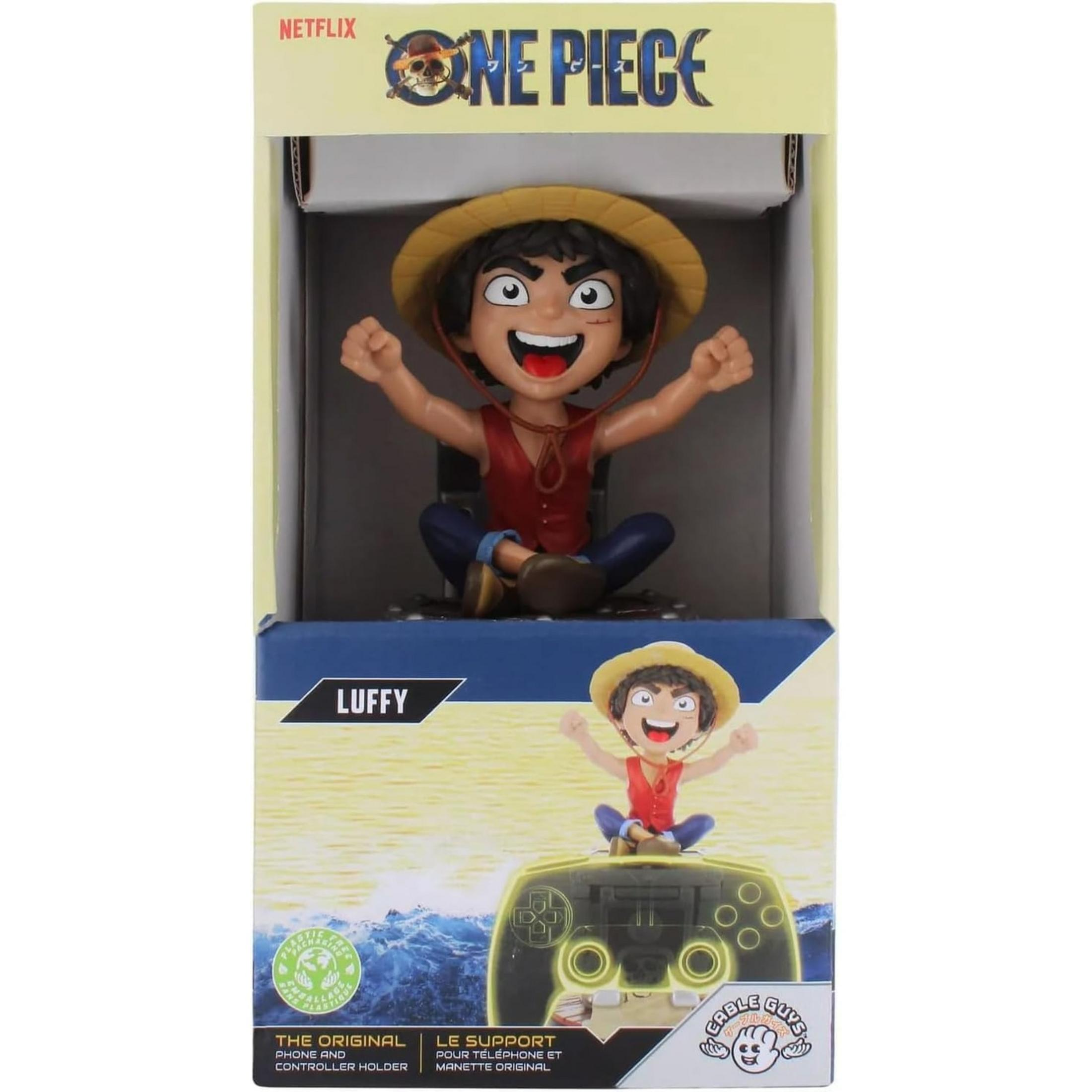 Figura di Luffy da One Piece in scatola su supporto controller, con onde sullo sfondo.