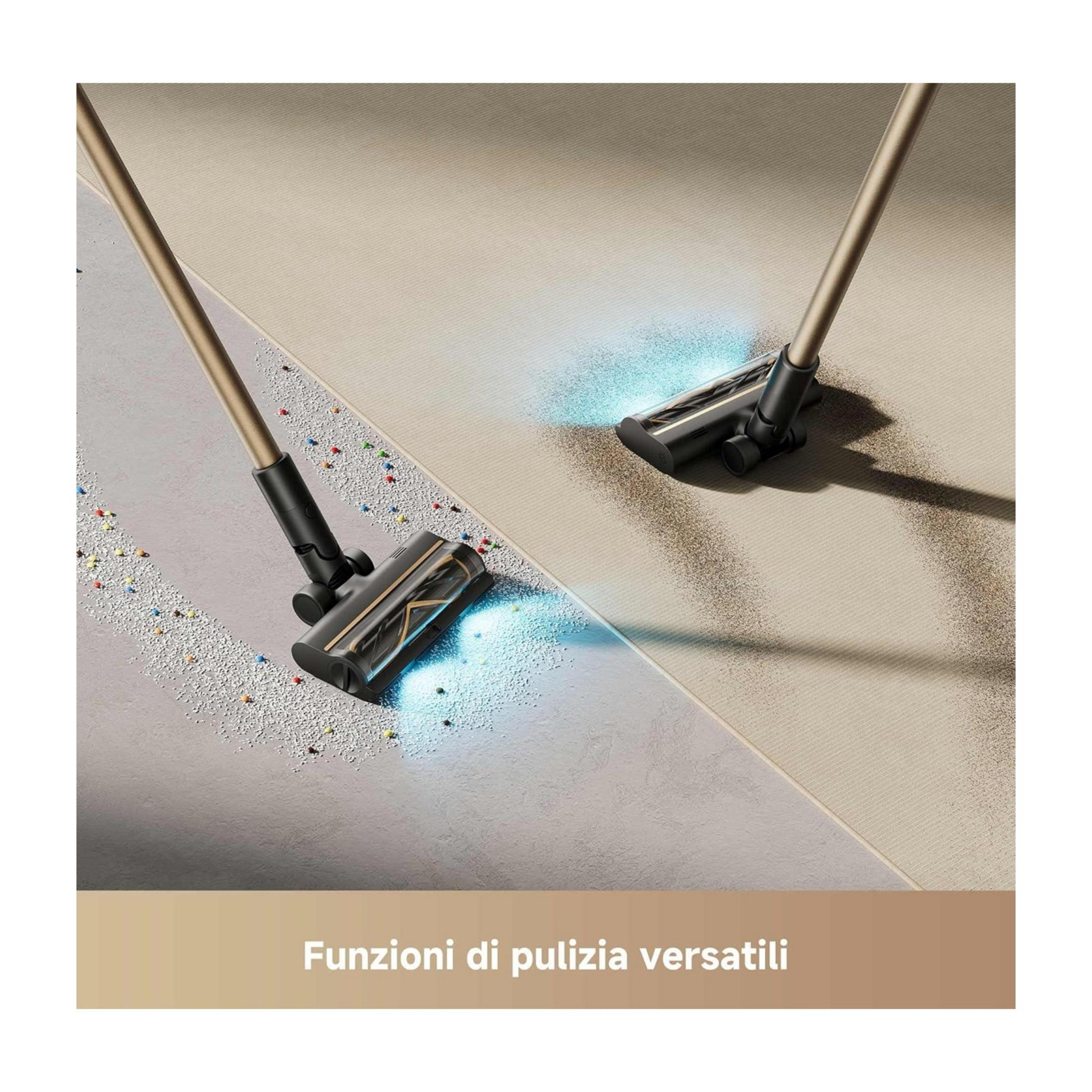 Głowica odkurzacza czyści szarą podłogę z kolorowymi okruszkami i beżowy dywan.