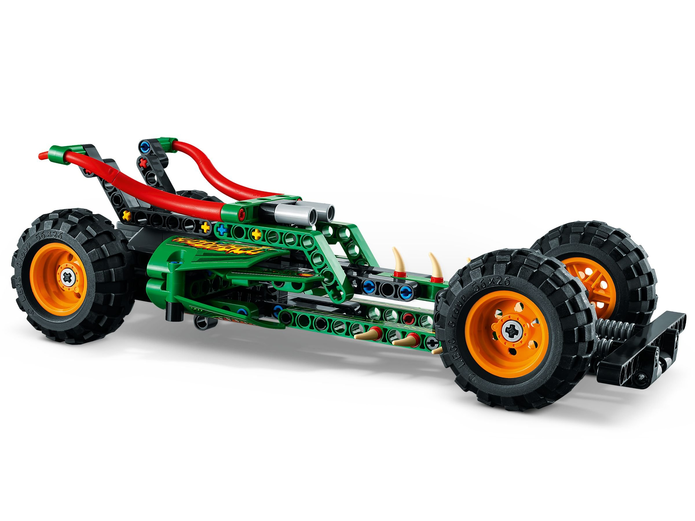 Un veicolo Lego verde con ruote grandi e manubrio rosso su sfondo bianco.
