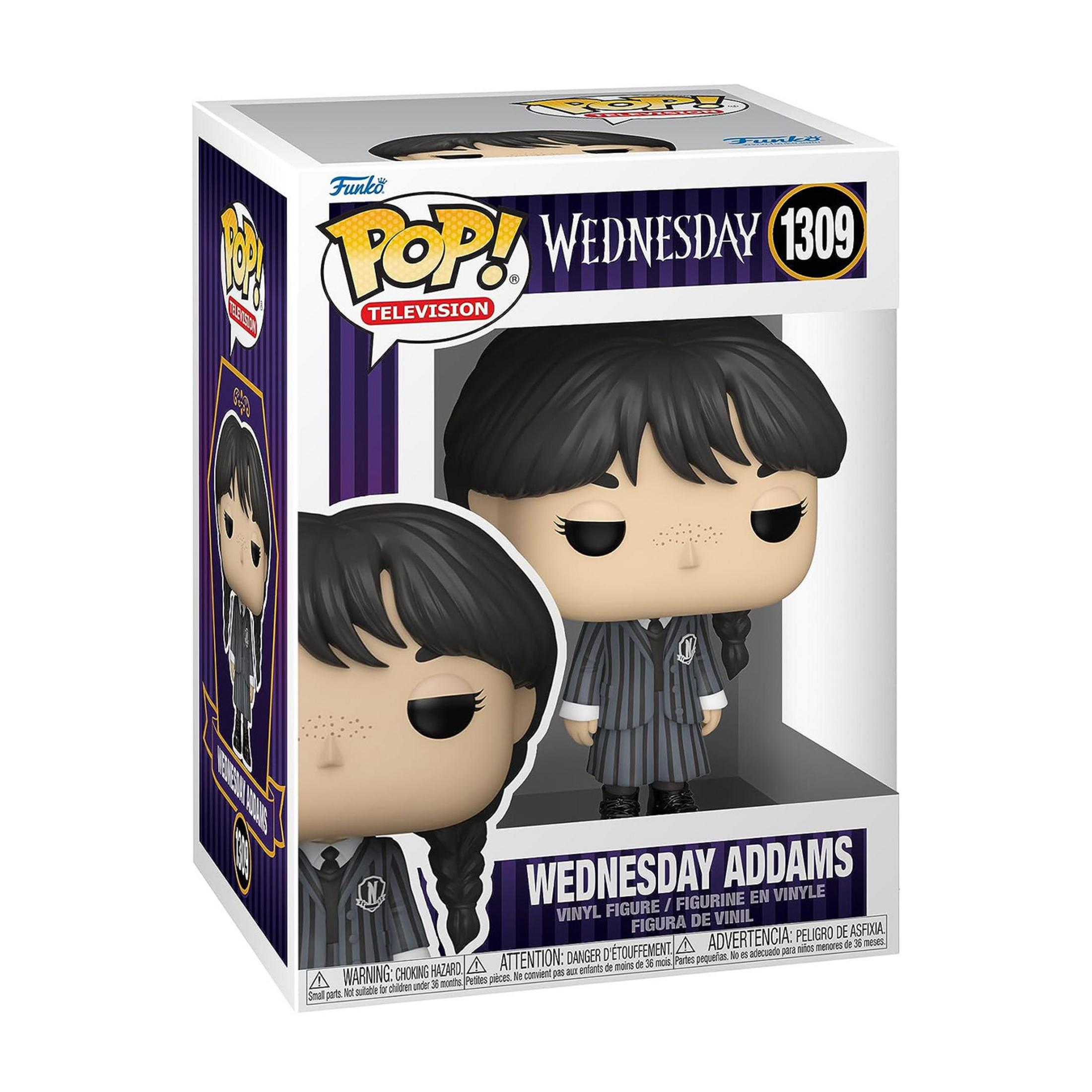 Action figure Funko Pop di Wednesday Addams in abito a righe.