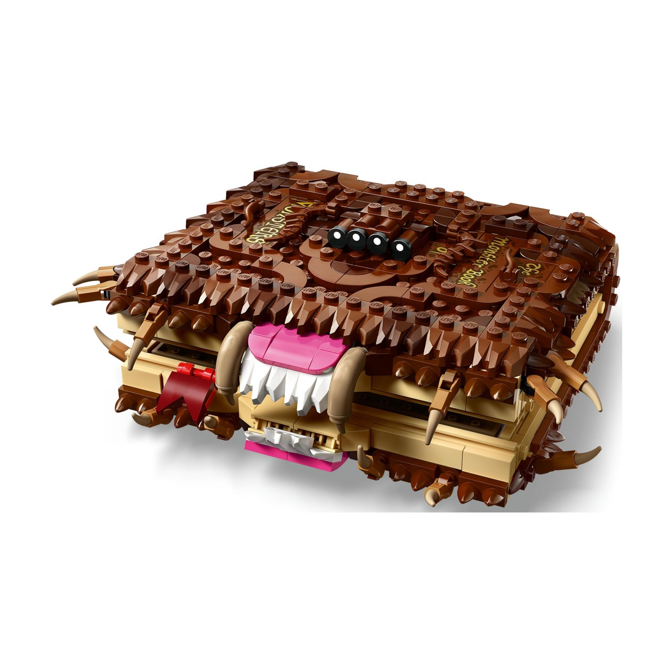 Brązowa książka Lego z zębami, oczami i rogami, przypominająca potwora.