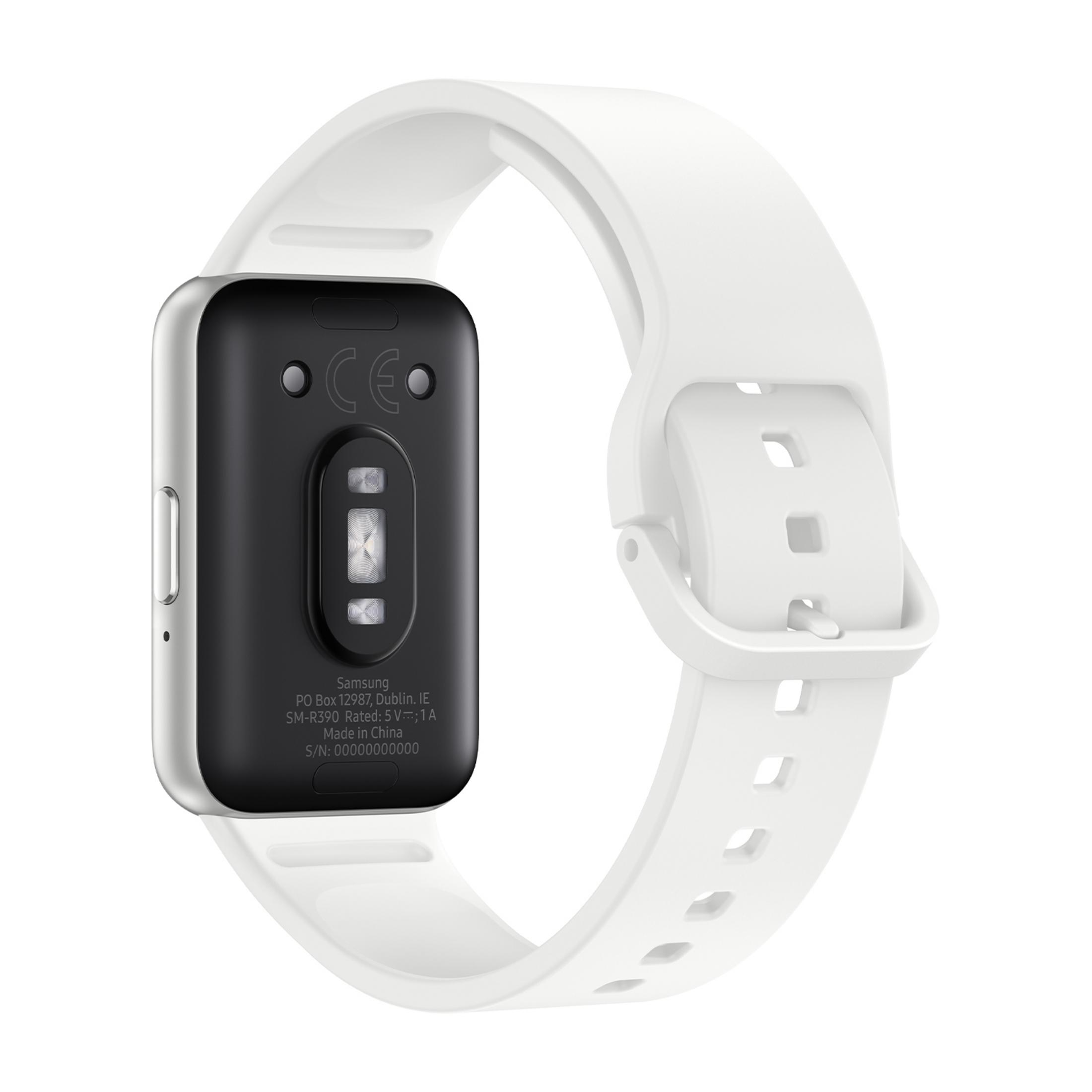 Rückseite einer weißen Smartwatch mit schwarzem Gehäuse und Herzfrequenzsensor.
