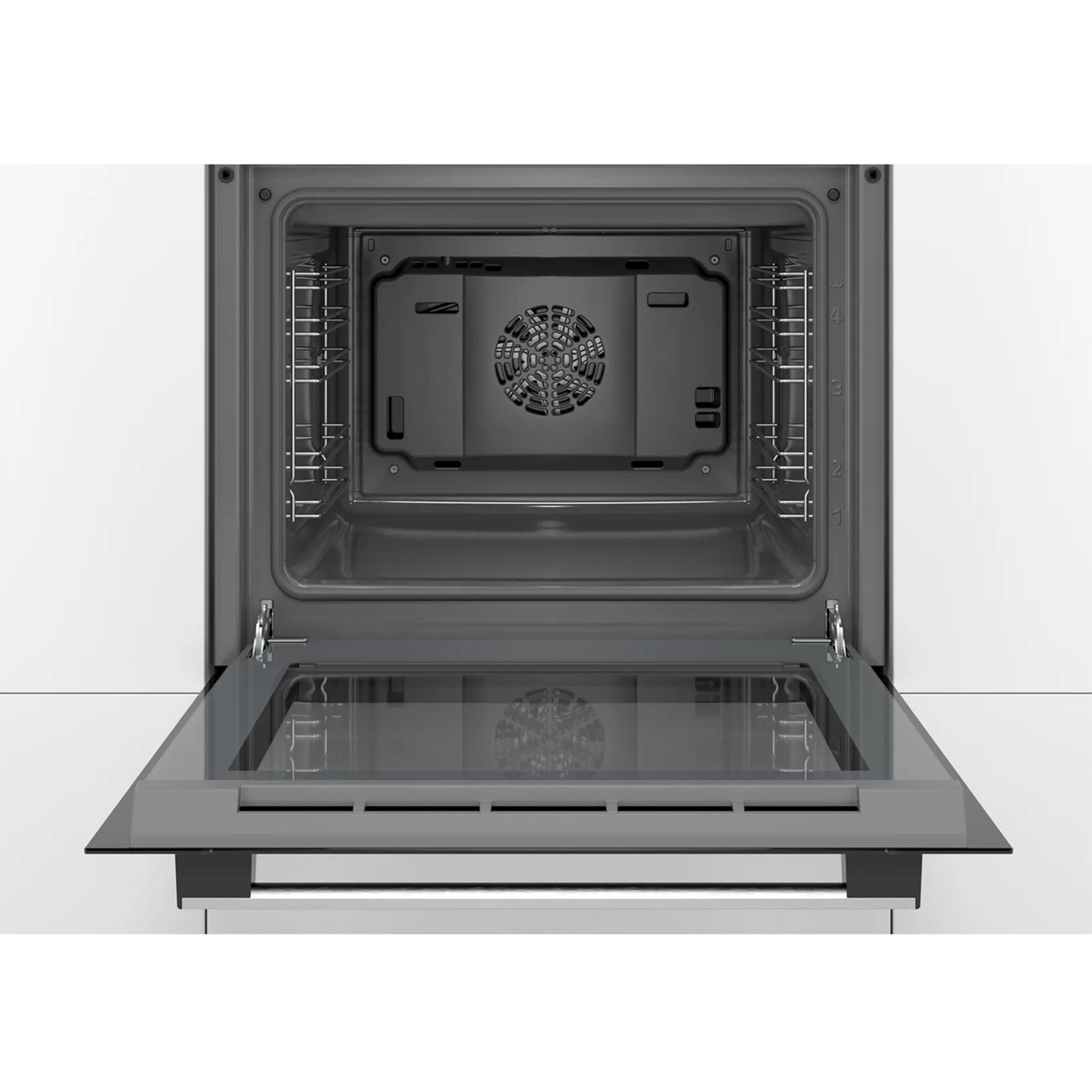 Un forno aperto con porta in vetro e ventola interna.