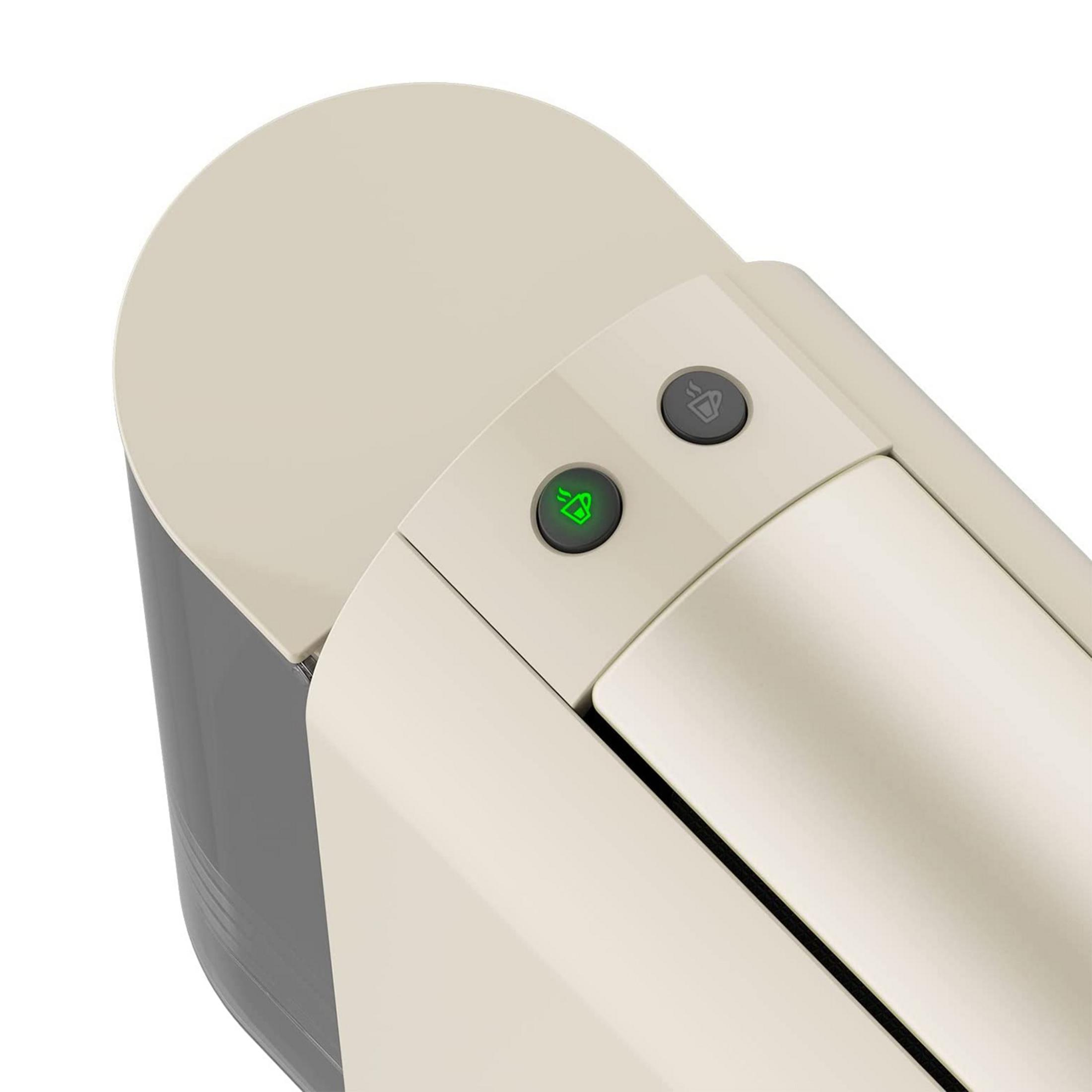 Beżowa pokrywa ekspresu do kawy z zielonym i szarym przyciskiem.