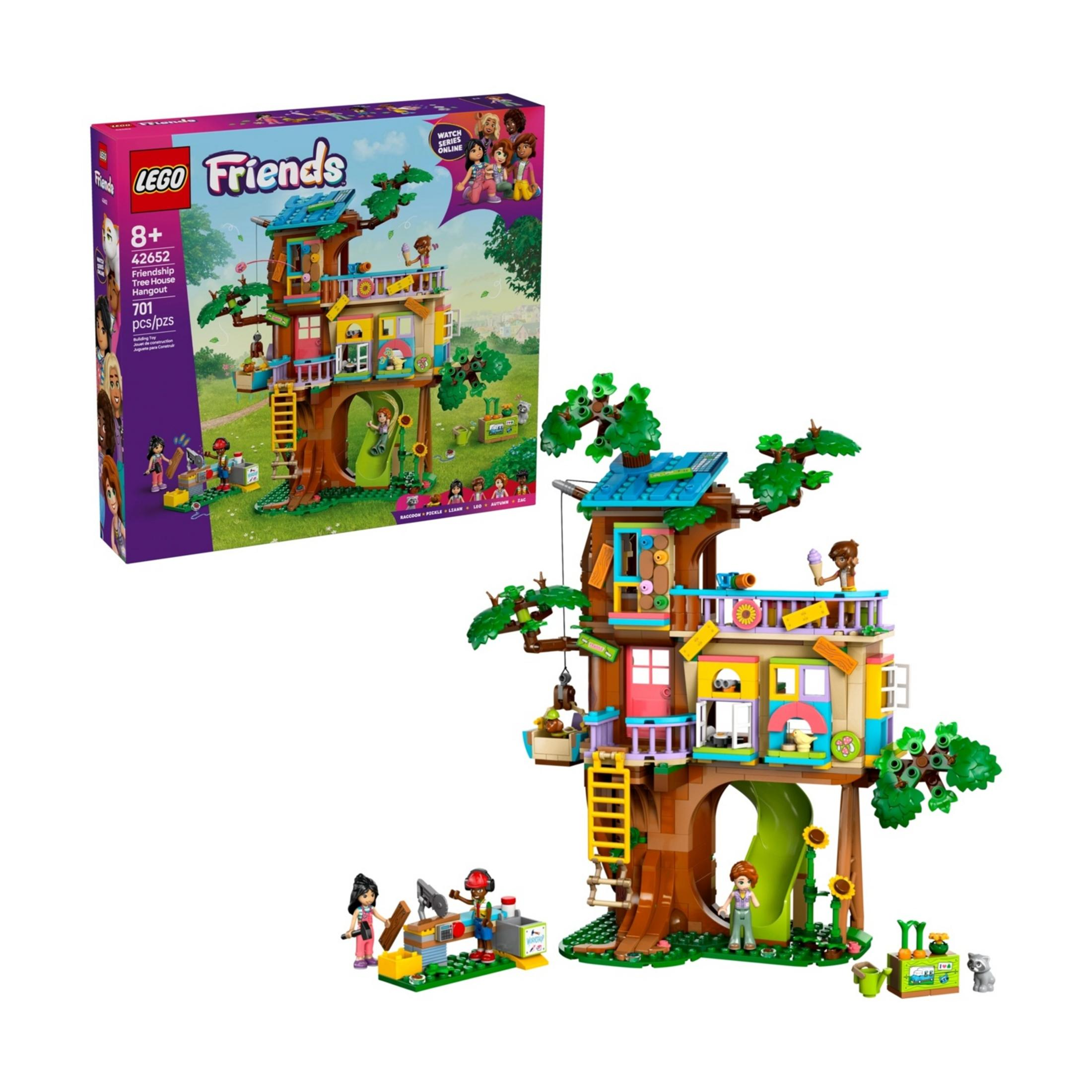 Zabawkowa chatka na drzewie LEGO Friends z figurkami, zjeżdżalnią, drabiną i akcesoriami.