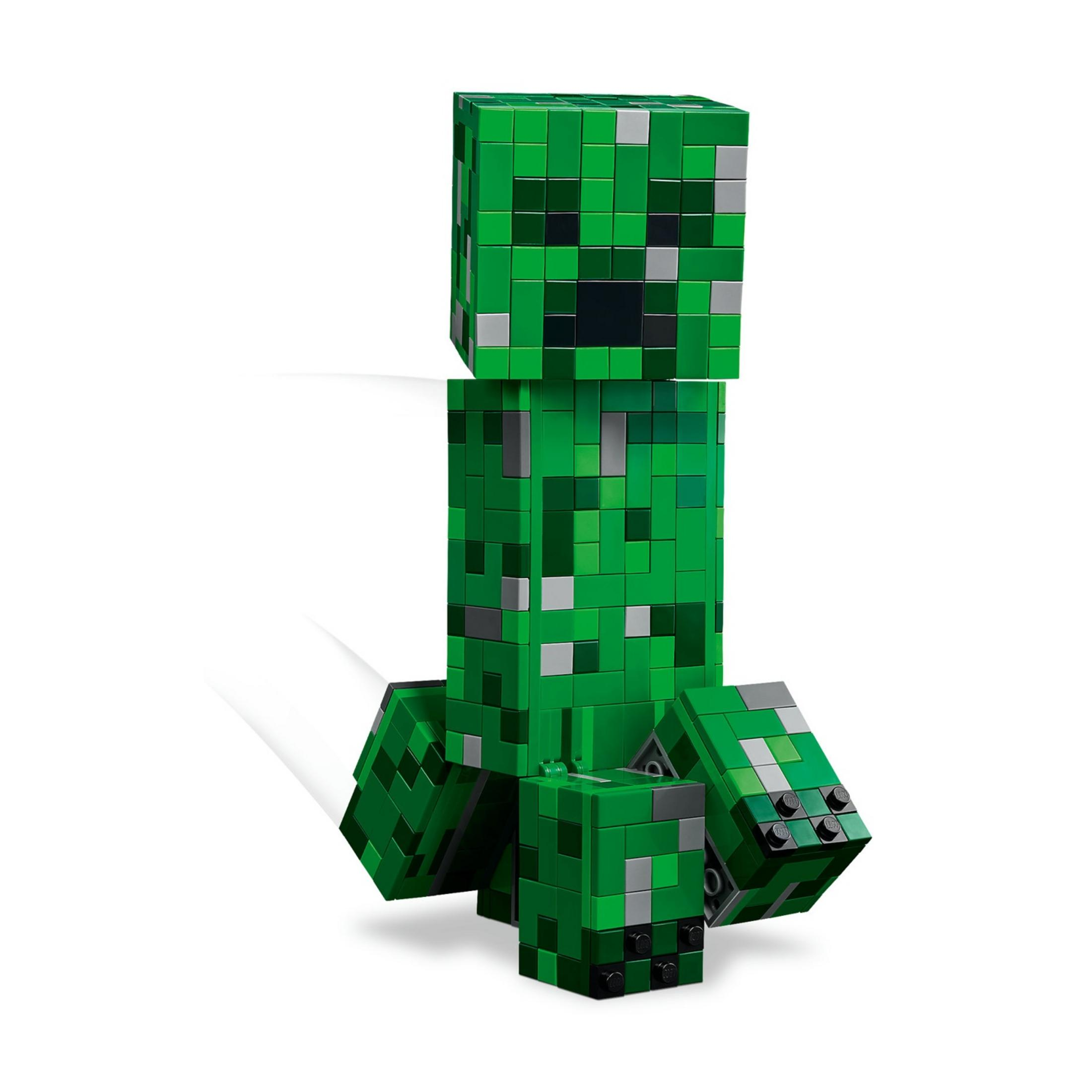 Zielony Creeper z Minecraft z klocków LEGO siedzi z nogami do przodu.