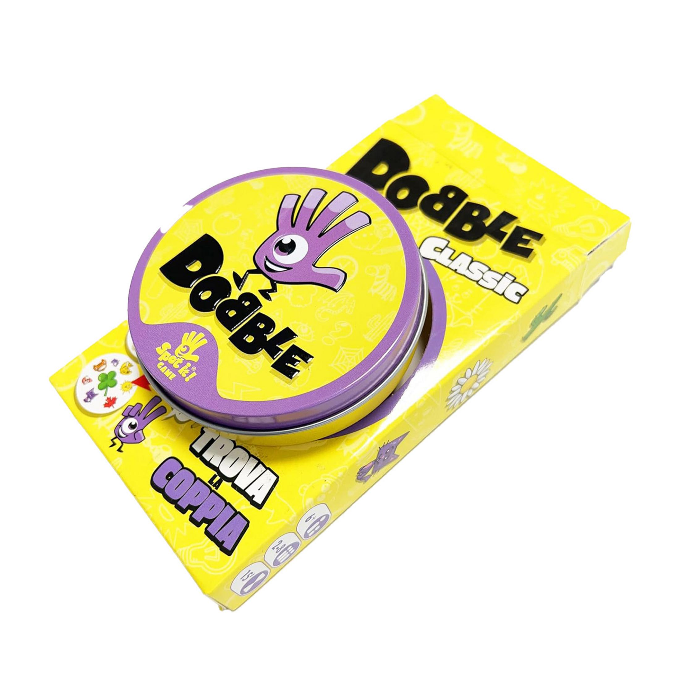 Il gioco Dobble Classic con una scatola rotonda e confezione gialla.