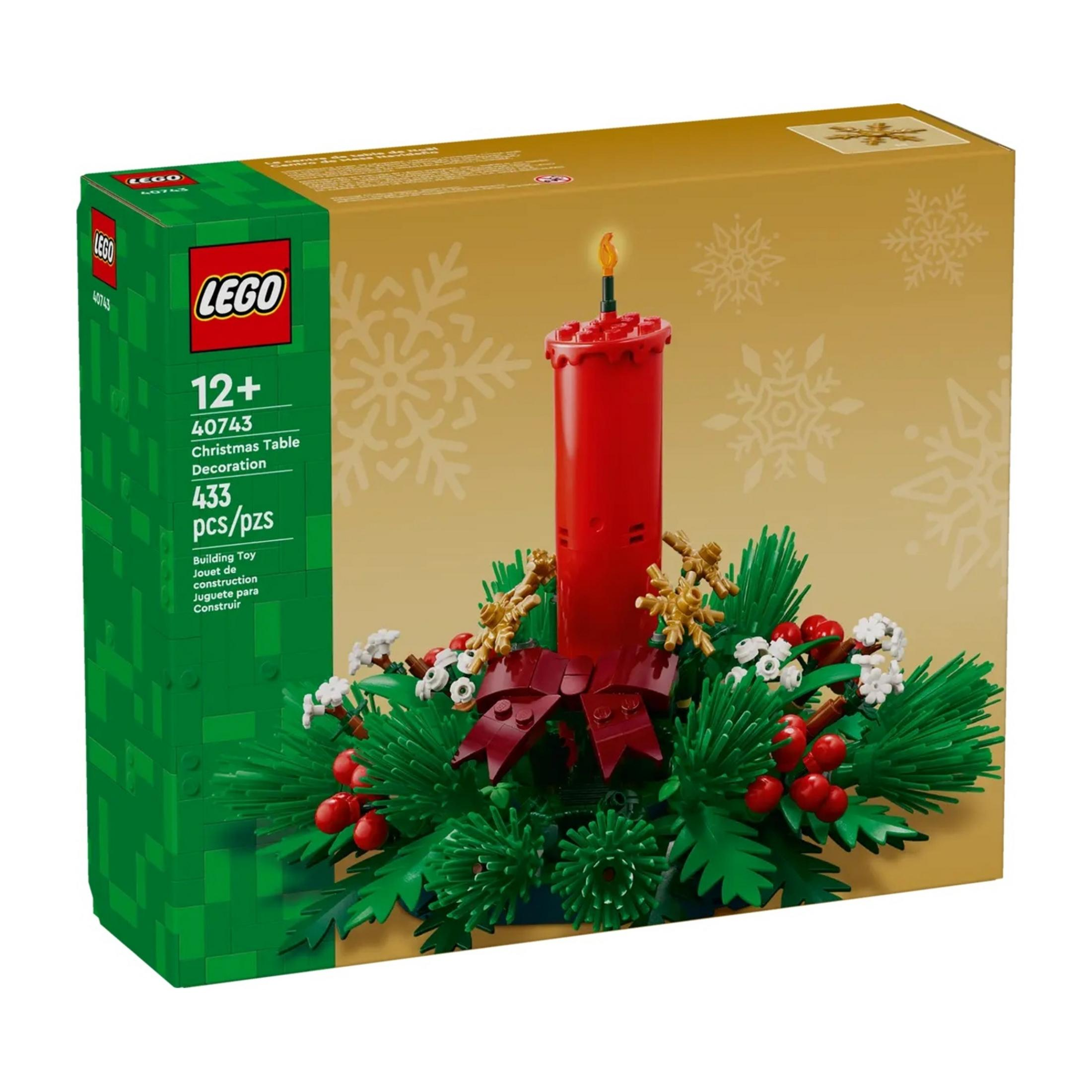 LEGO 40743 set: Kırmızı mum, çam dalları, yemişler ve fiyonk ile Noel masa süsü.