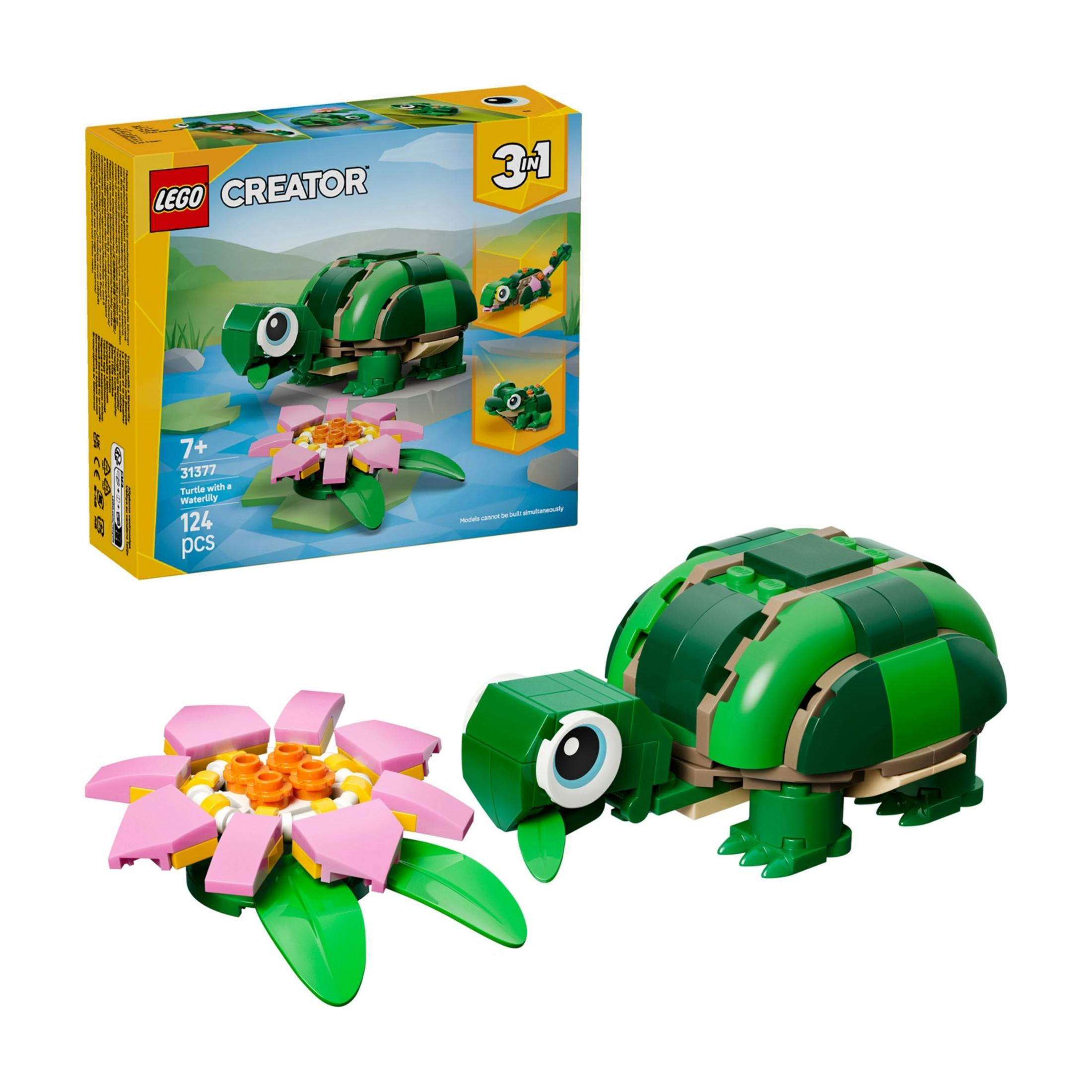 Zielony żółw Lego z zabawką lilii wodnej z różowym kwiatem.