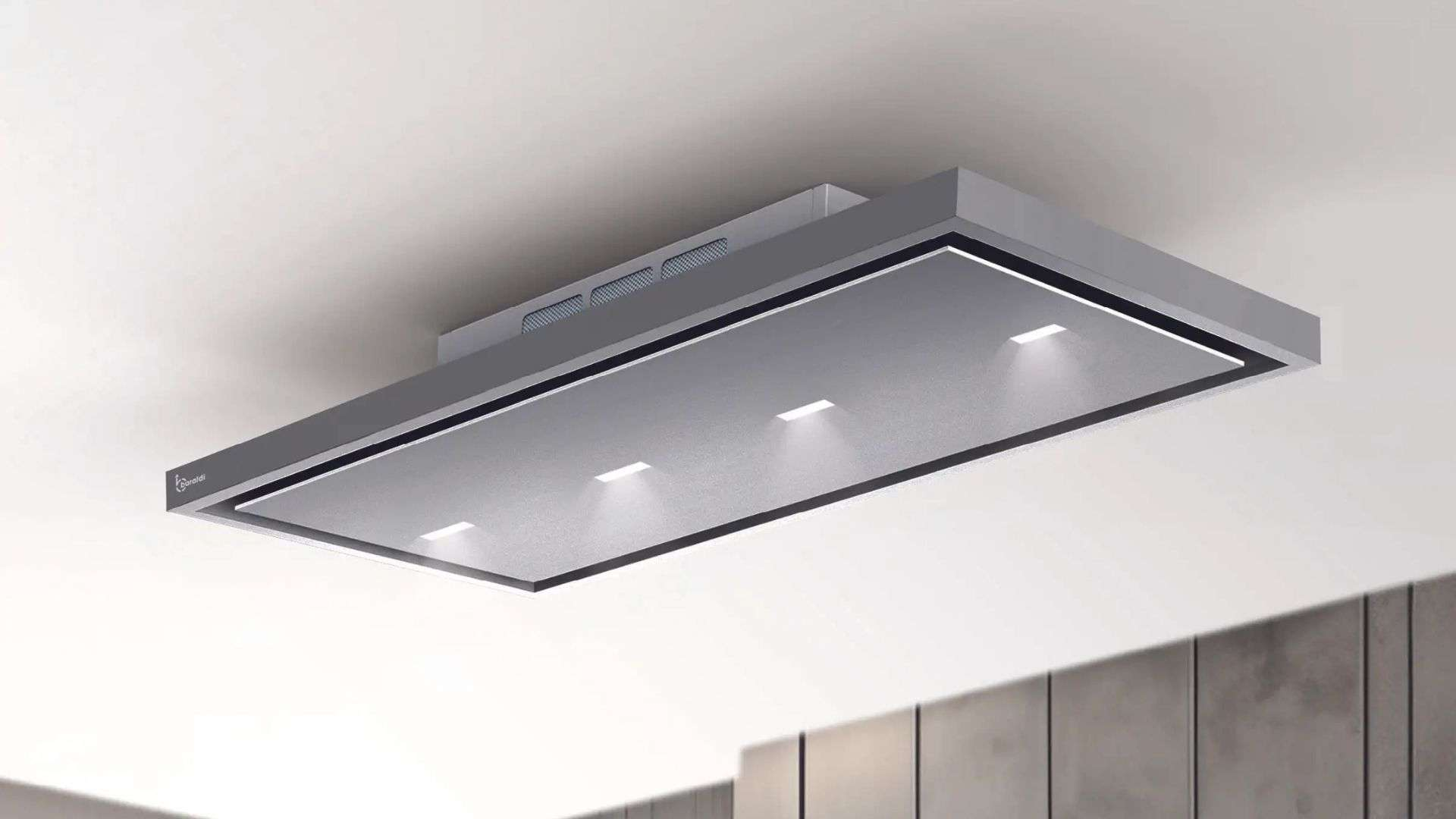 Una moderna cappa aspirante in metallo con illuminazione integrata a soffitto.