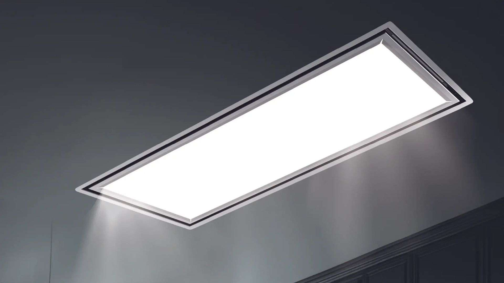 Una plafoniera rettangolare con luce bianca brillante e cornice scura.