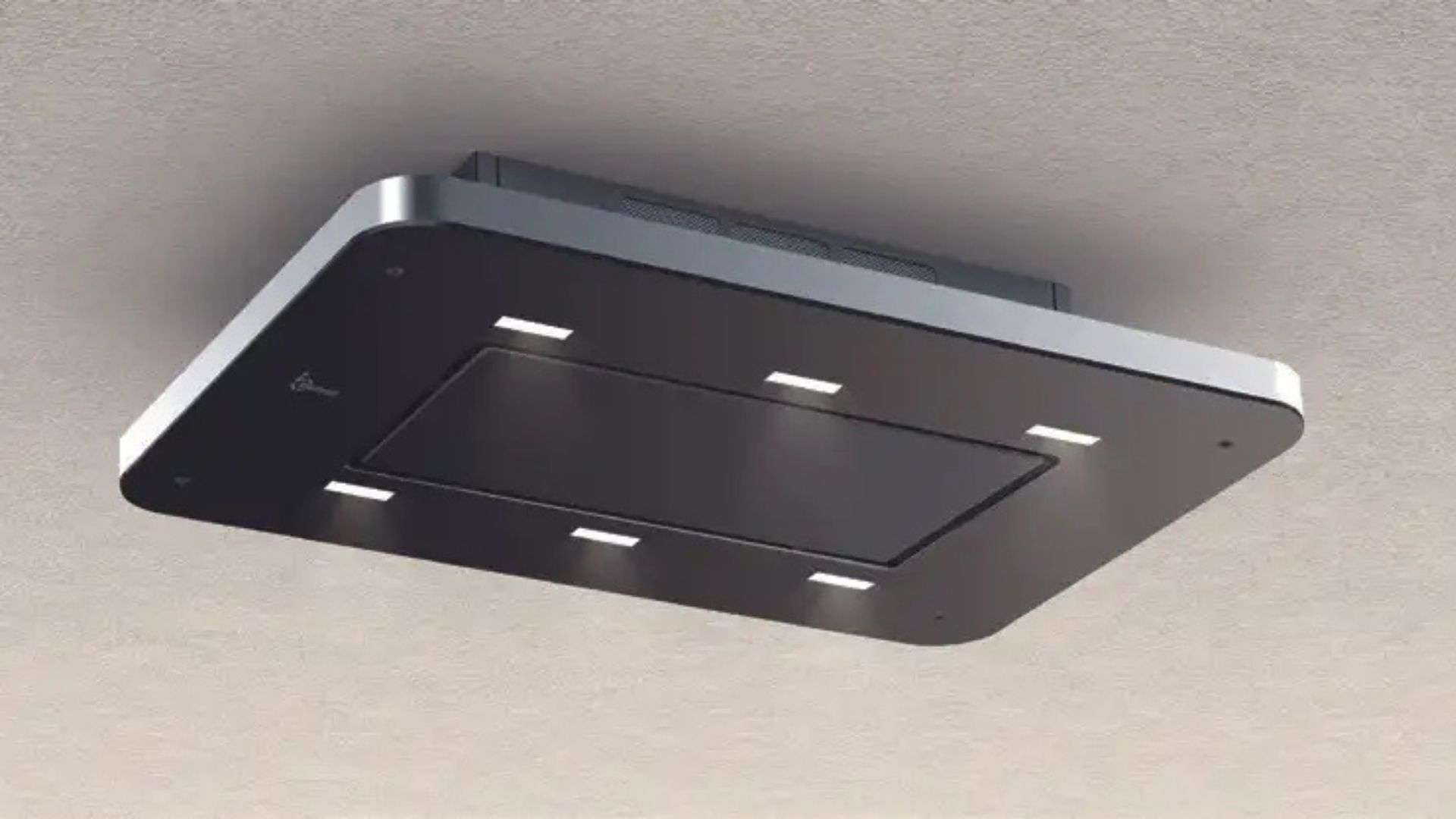 Moderna cappa aspirante in acciaio inox e vetro con luci.